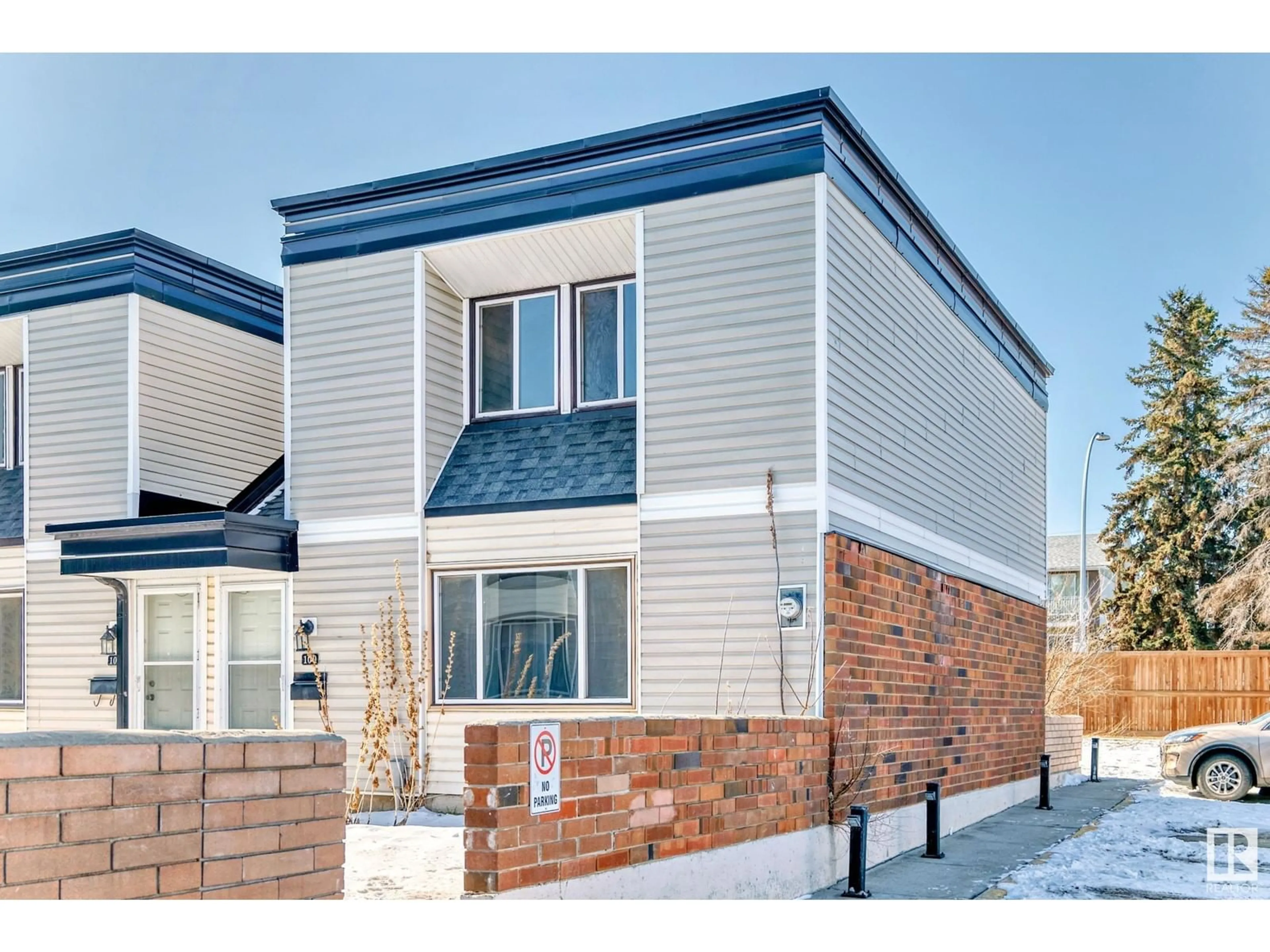 Home with brick exterior material, street for #100 - 11421 34 ST, Edmonton Alberta T5W5J7