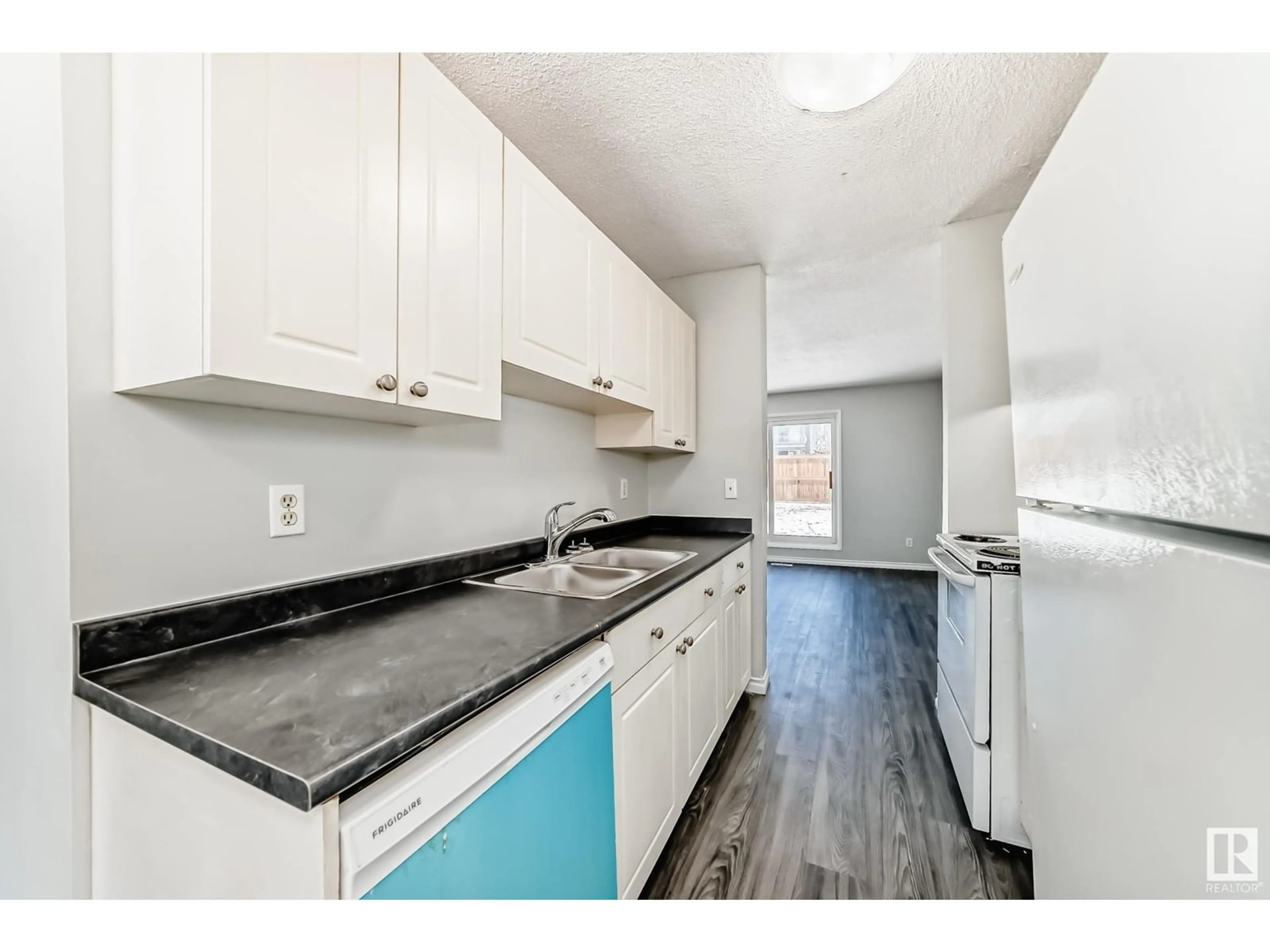Standard kitchen, unknown for #100 - 11421 34 ST, Edmonton Alberta T5W5J7