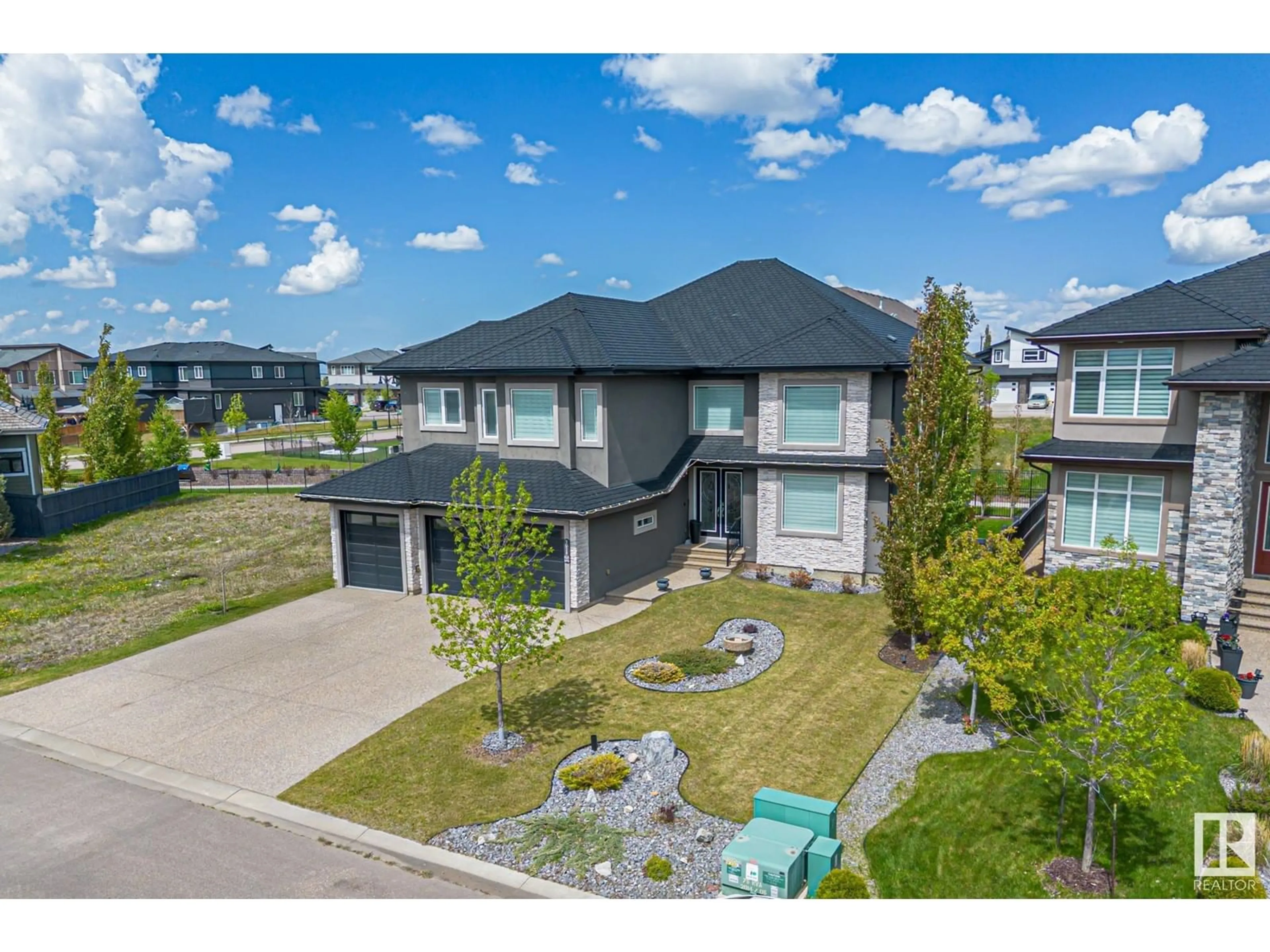 A pic from outside/outdoor area/front of a property/back of a property/a pic from drone, street for 3028 59 AV, Rural Leduc County Alberta T4X0X9
