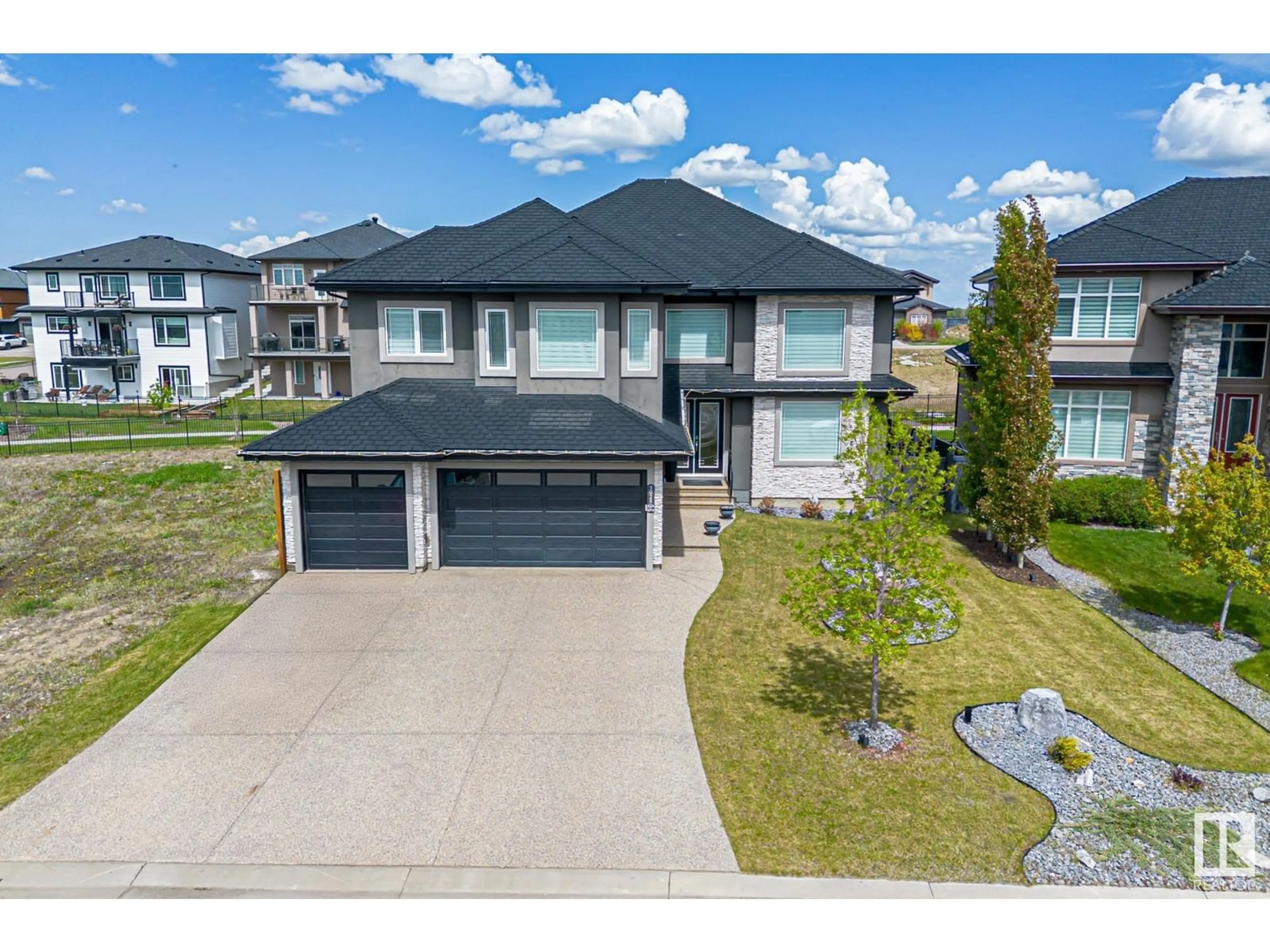 A pic from outside/outdoor area/front of a property/back of a property/a pic from drone, street for 3028 59 AV, Rural Leduc County Alberta T4X0X9