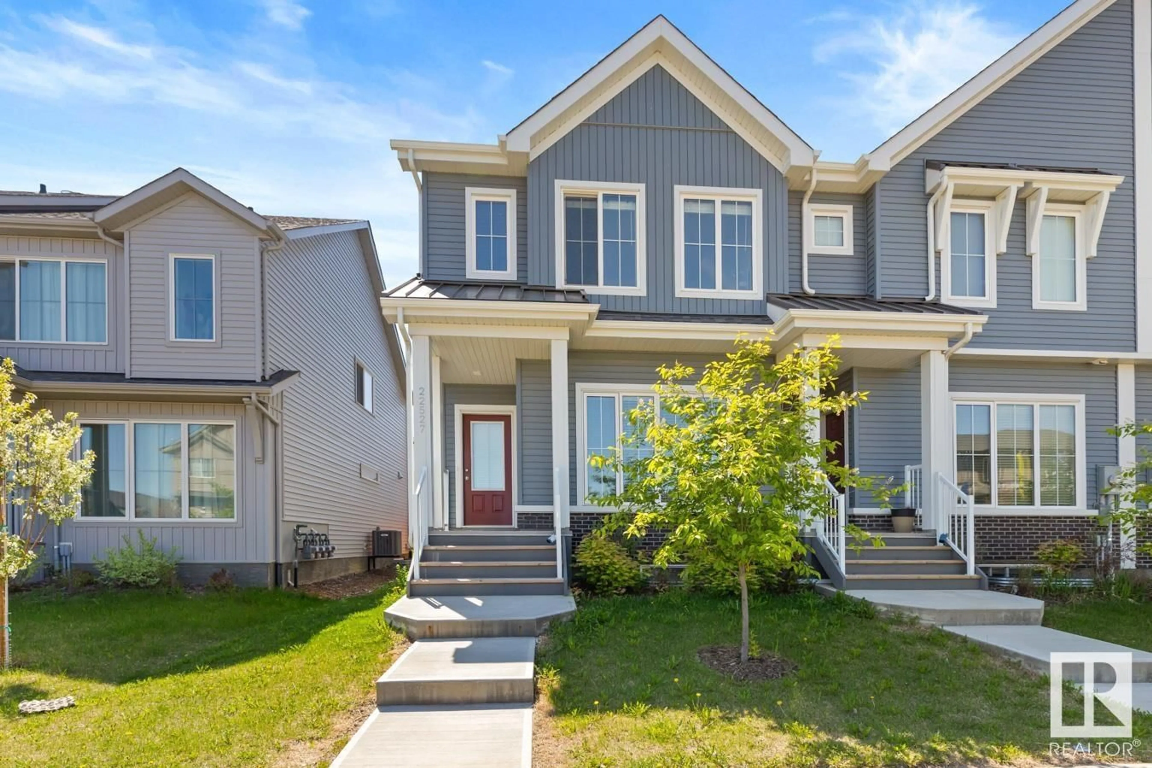 Home with vinyl exterior material, street for 22527 93 AV, Edmonton Alberta T5T7R5
