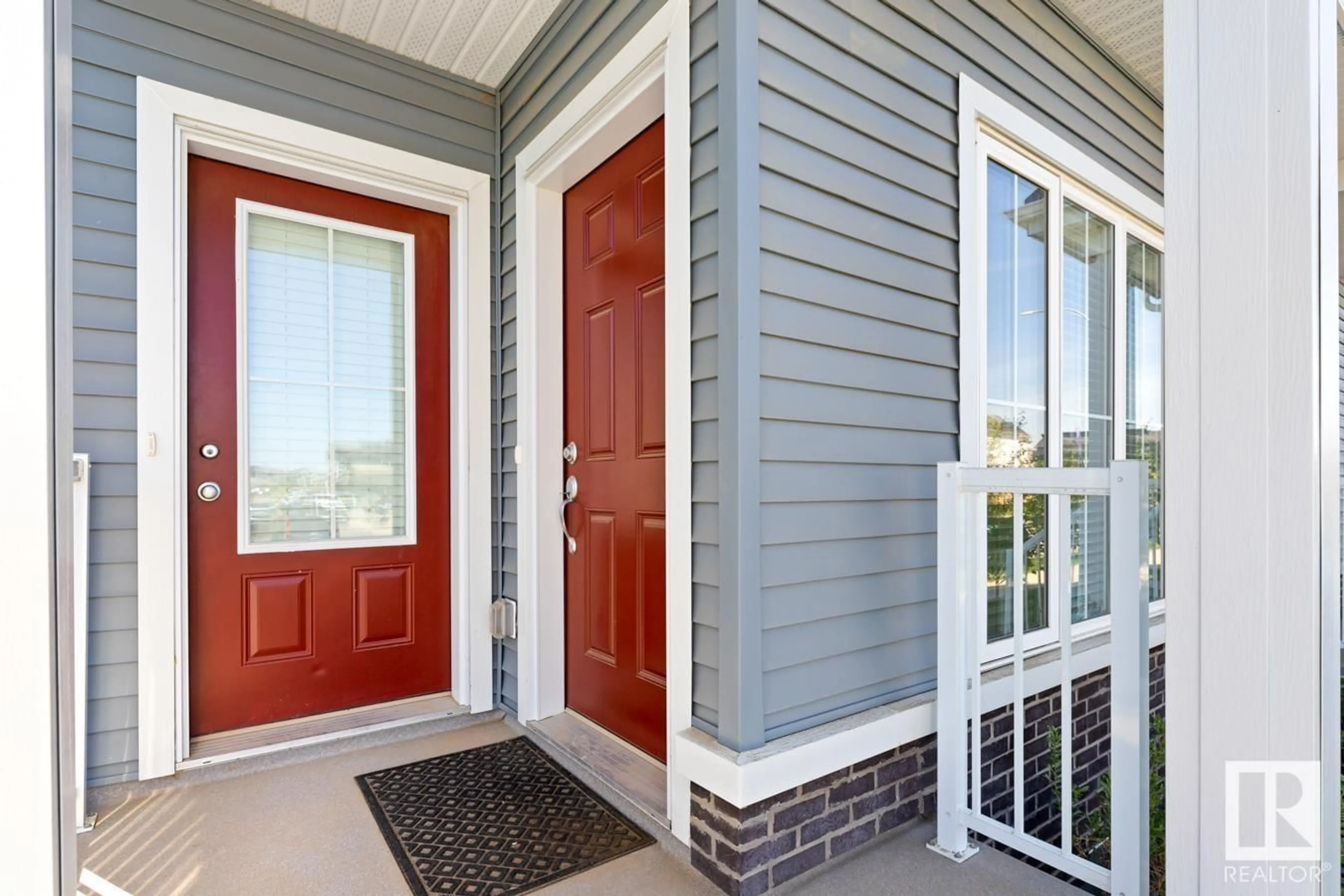 Home with vinyl exterior material, street for 22527 93 AV, Edmonton Alberta T5T7R5