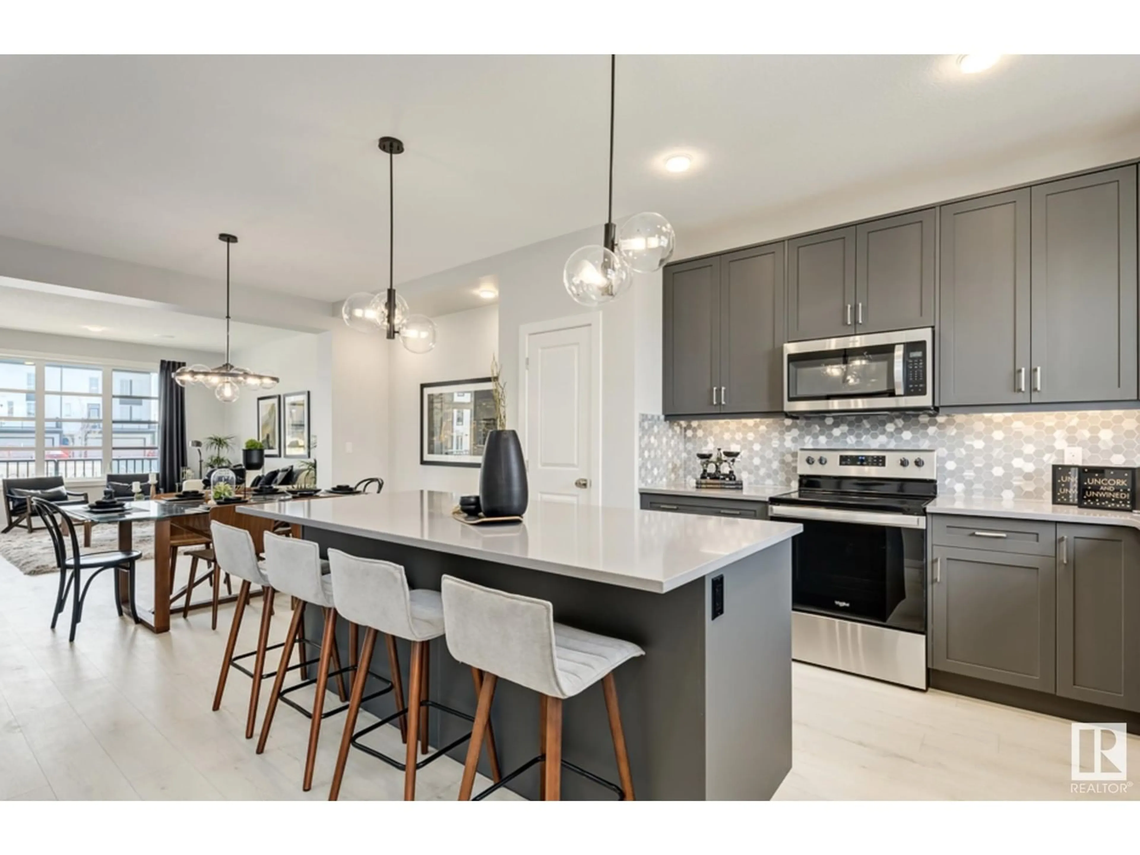 Open concept kitchen, ceramic/tile floor for 17203 3 ST, Edmonton Alberta T5Y4G7
