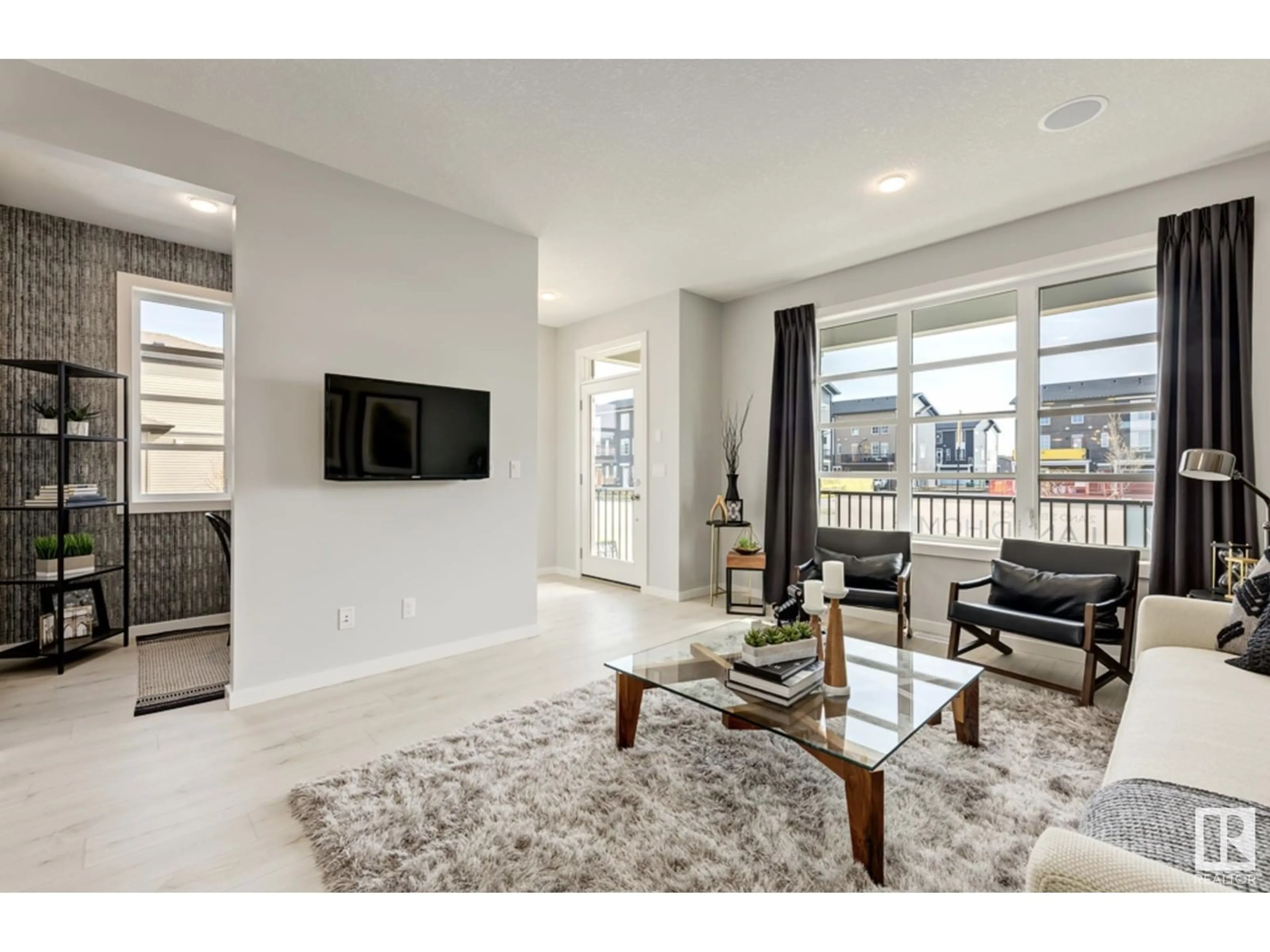 Living room with furniture, unknown for 17203 3 ST, Edmonton Alberta T5Y4G7