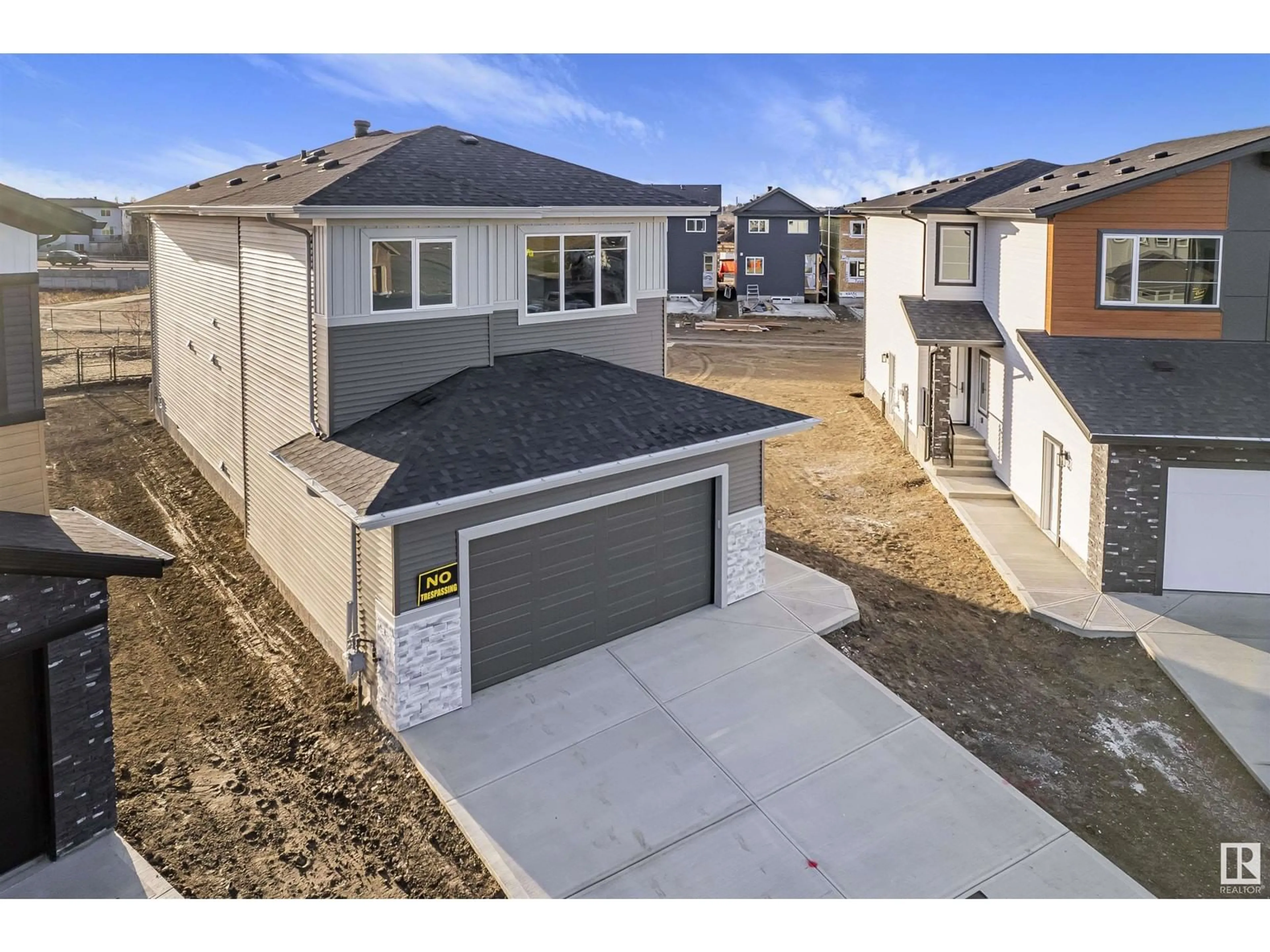 A pic from outside/outdoor area/front of a property/back of a property/a pic from drone, street for NE - 6211 18 ST, Rural Leduc County Alberta T4X3C7