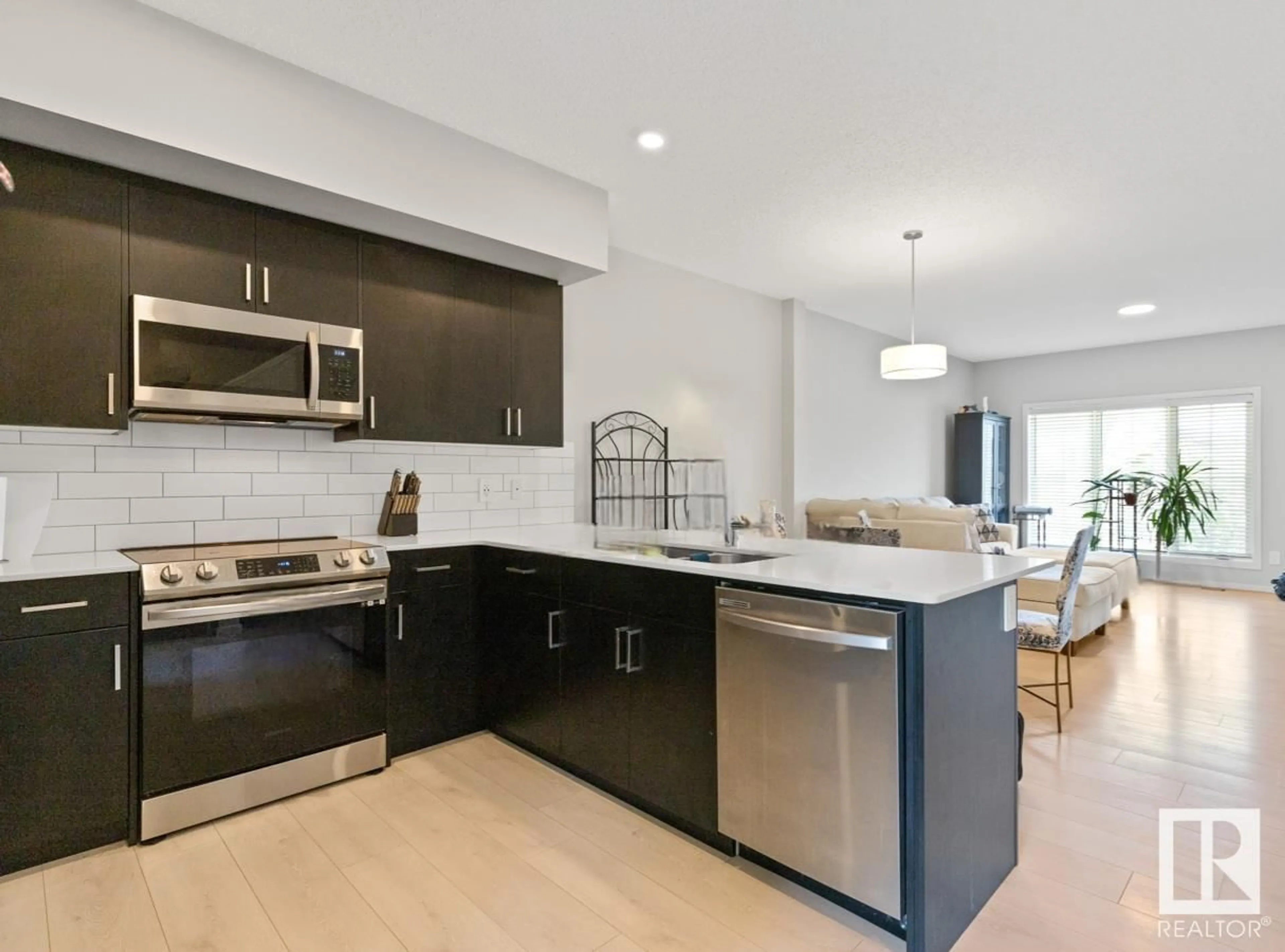 Open concept kitchen, ceramic/tile floor for 22529 93 AV, Edmonton Alberta T5T7R5