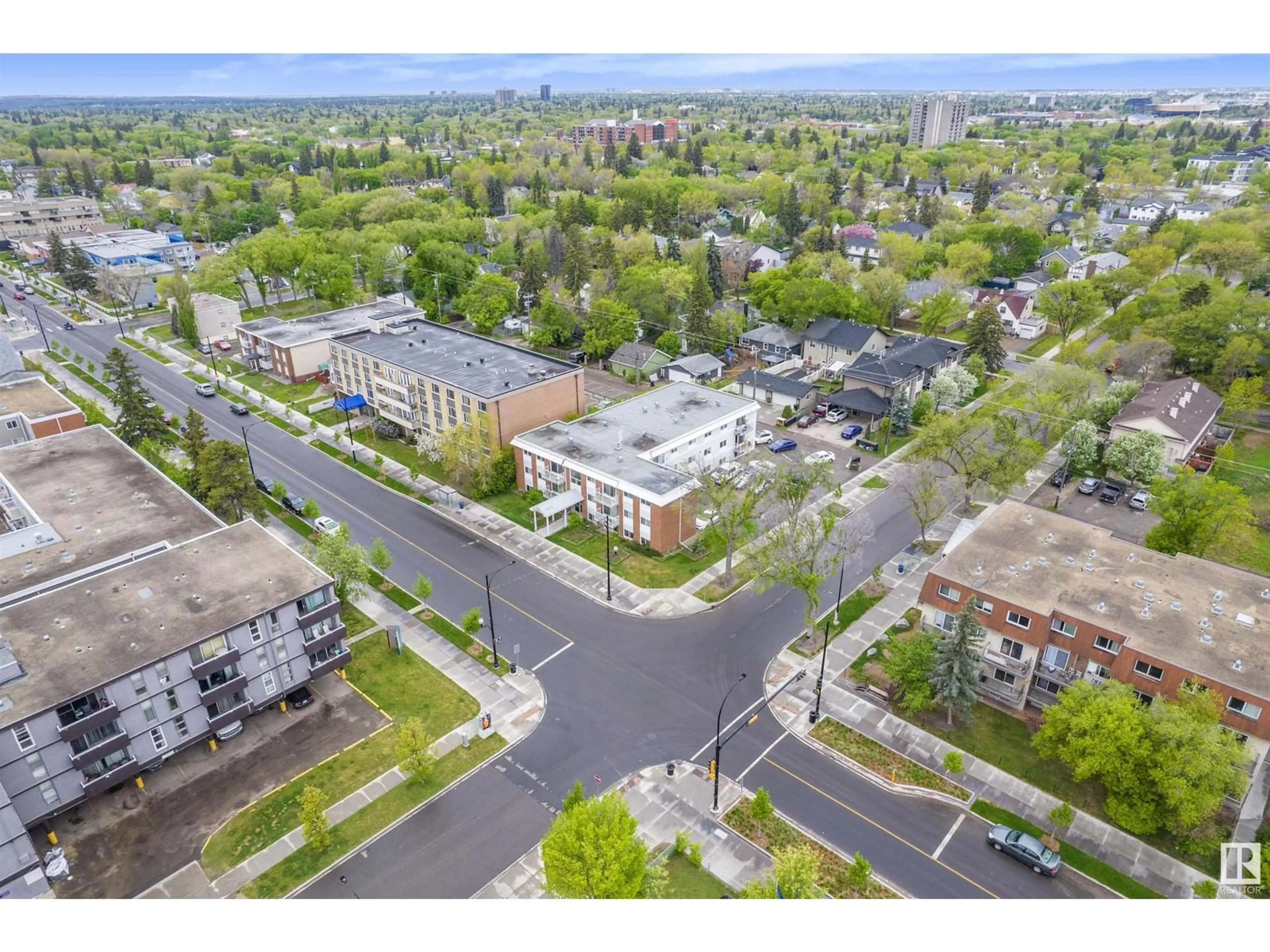 A pic from outside/outdoor area/front of a property/back of a property/a pic from drone, street for #303 - 11340 124 ST, Edmonton Alberta T5M0K1
