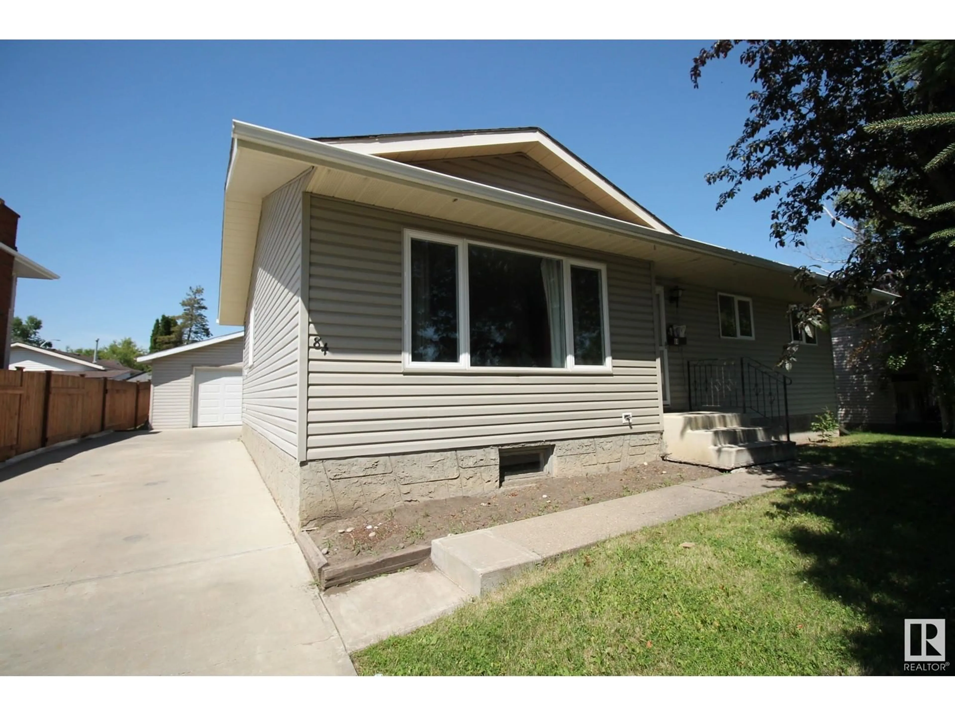Home with vinyl exterior material, street for 84 ARLINGTON DR, St. Albert Alberta T8N1N1