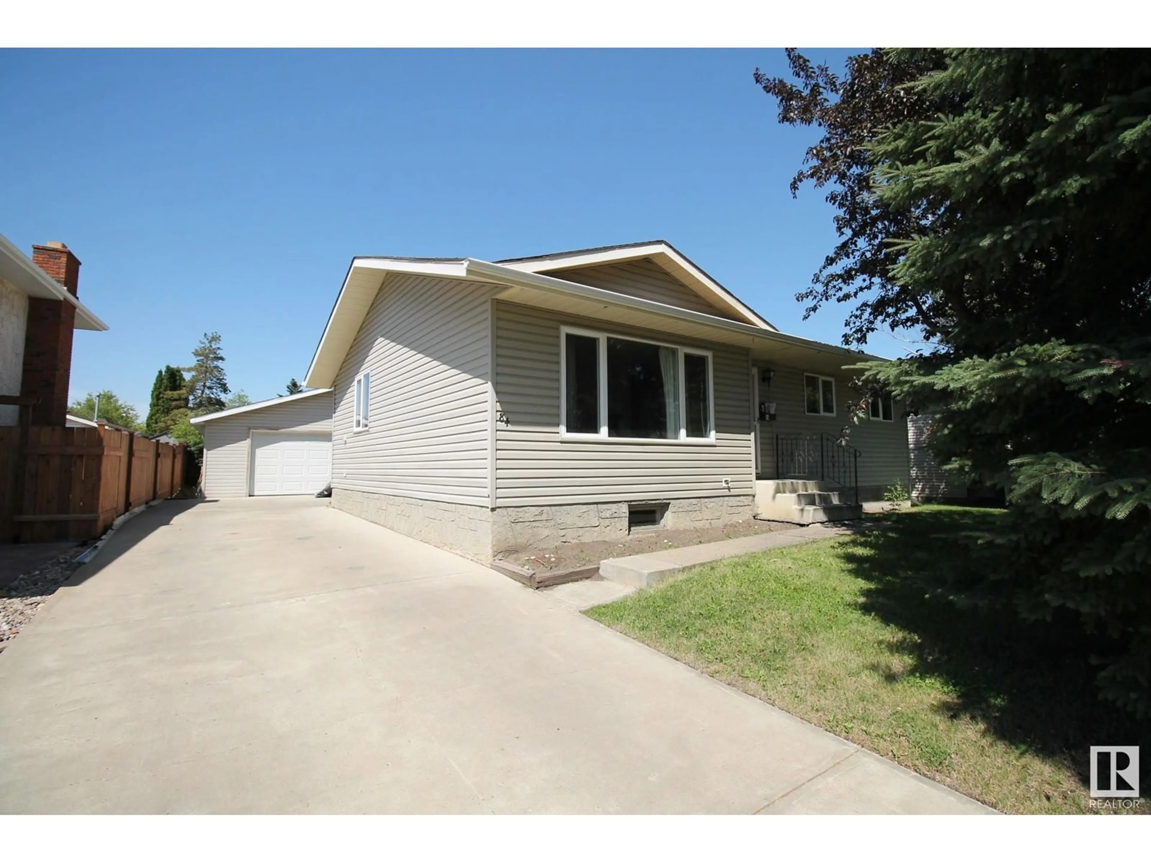 Home with vinyl exterior material, street for 84 ARLINGTON DR, St. Albert Alberta T8N1N1