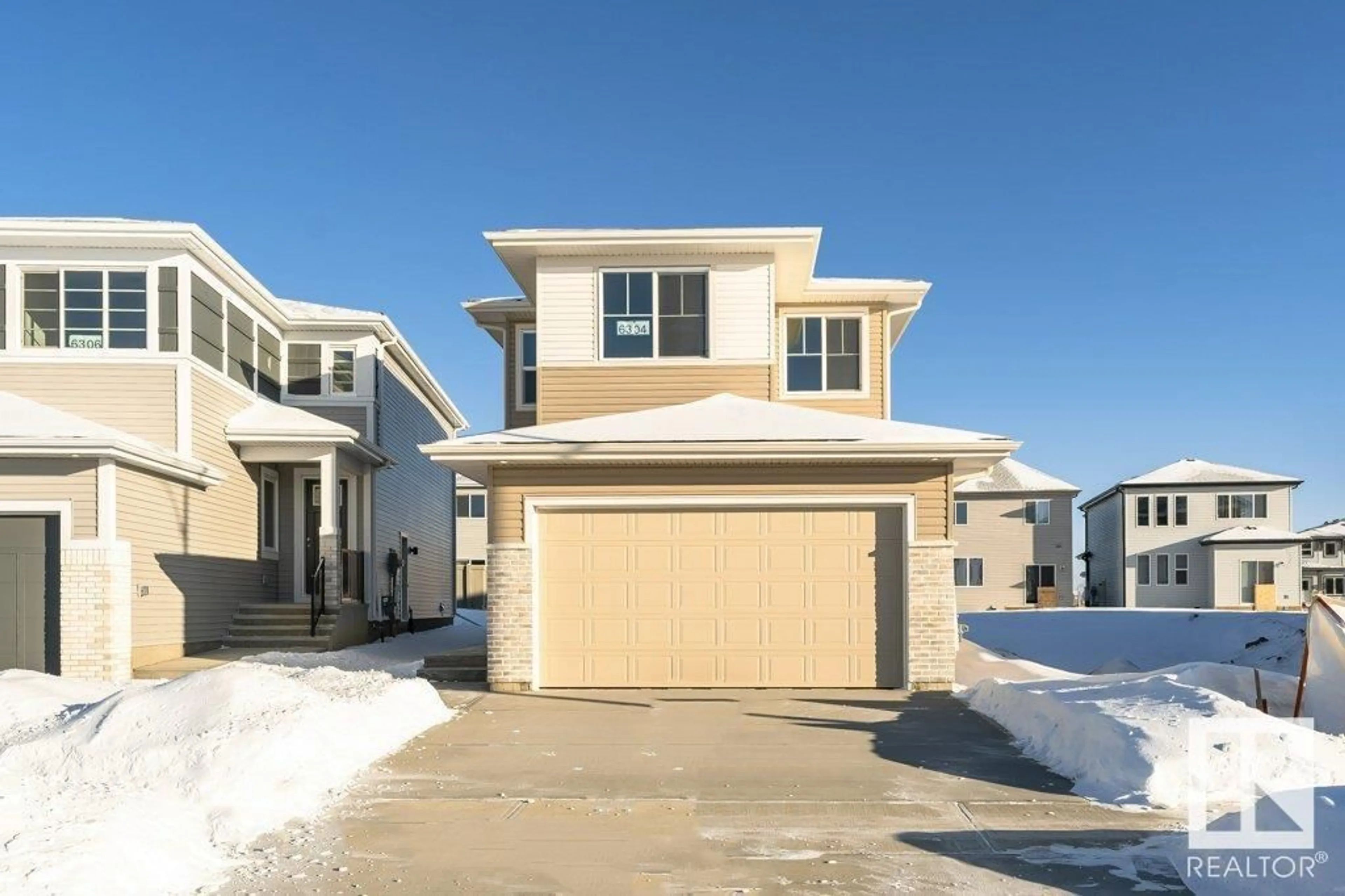 Home with vinyl exterior material, street for SW - 2524 158 ST, Edmonton Alberta T6W5P6