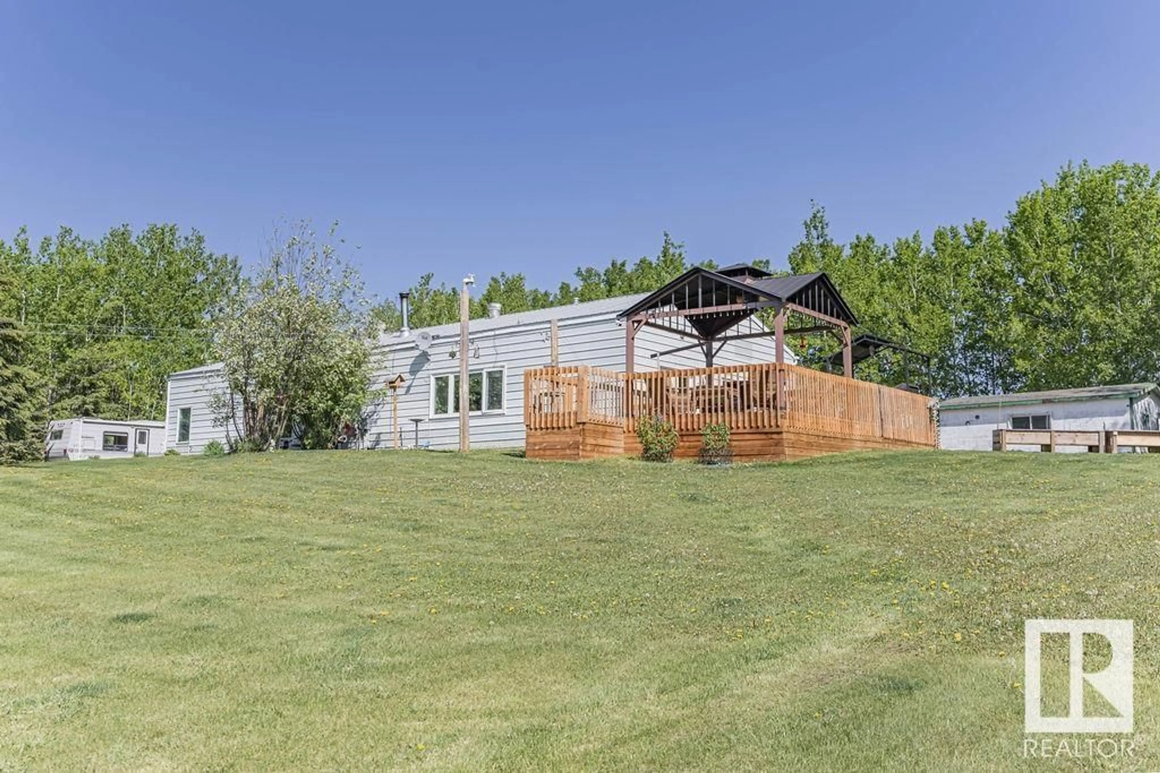 A pic from outside/outdoor area/front of a property/back of a property/a pic from drone, mountain view for 58031 RANGE ROAD 21, Rural Barrhead County Alberta T0G0H0