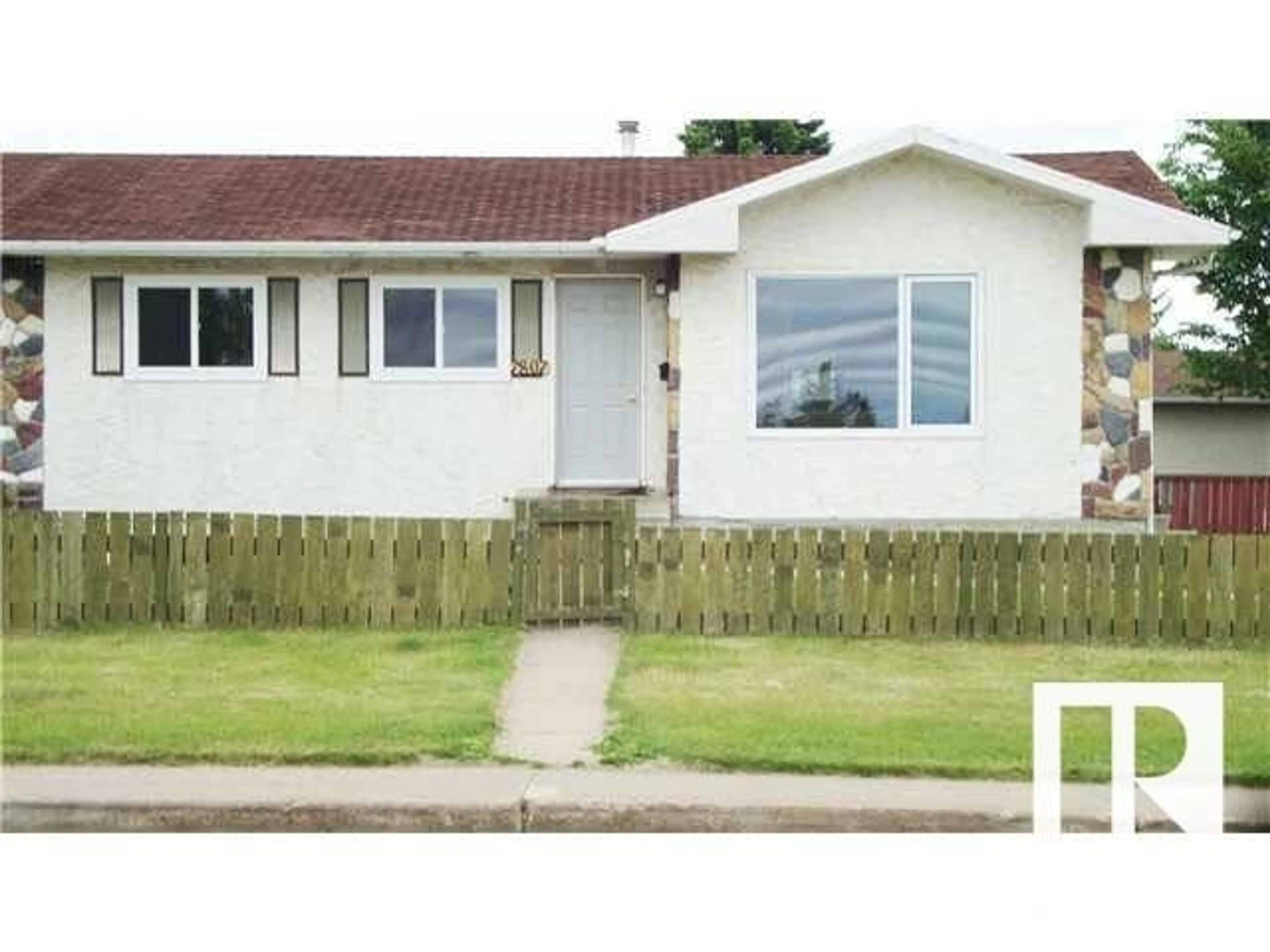 Home with vinyl exterior material, street for 7807 36 AV NW, Edmonton Alberta T6K0C5