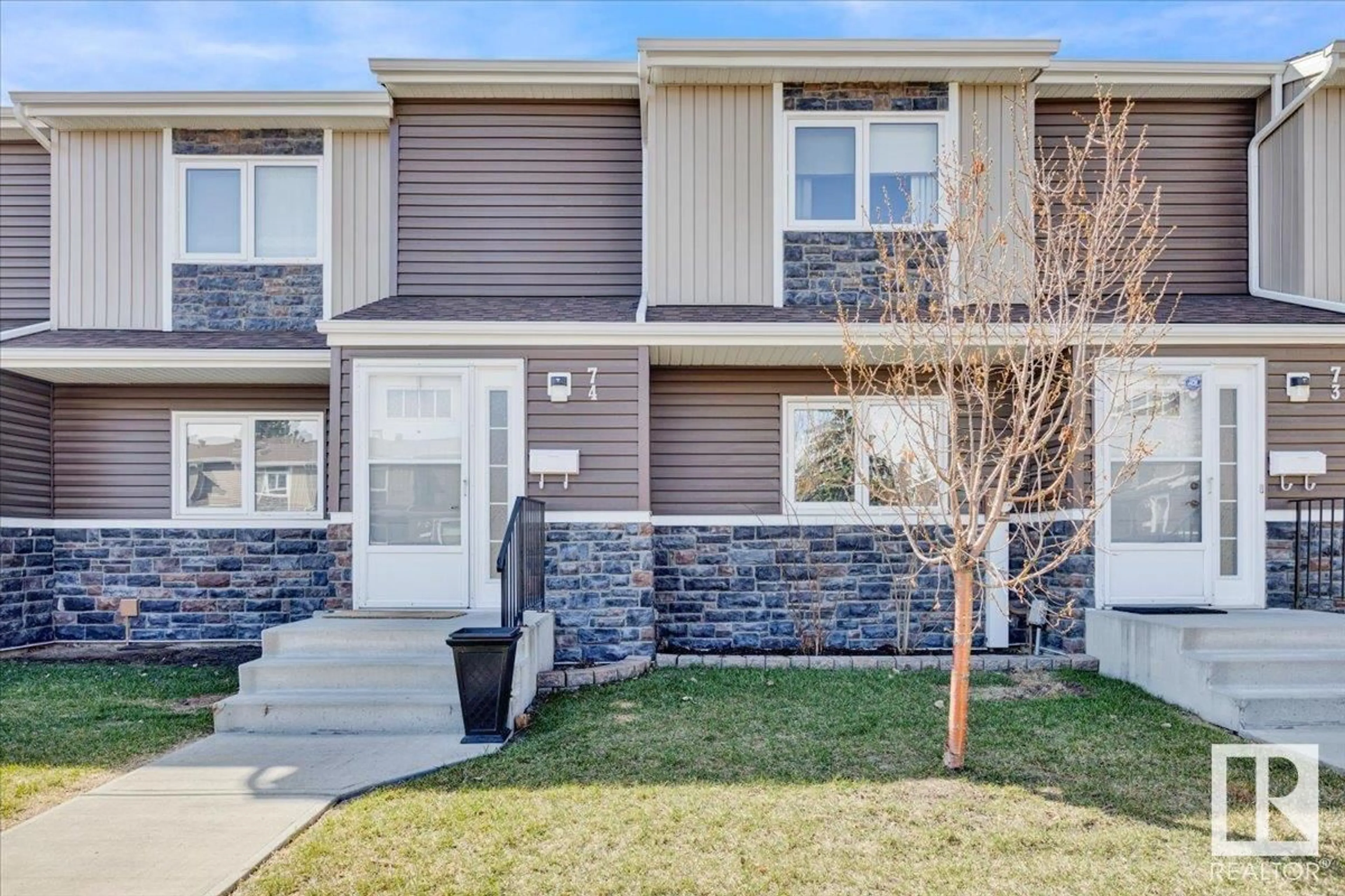 Home with vinyl exterior material, street for #74 - 3115 119 ST, Edmonton Alberta T6J5N5