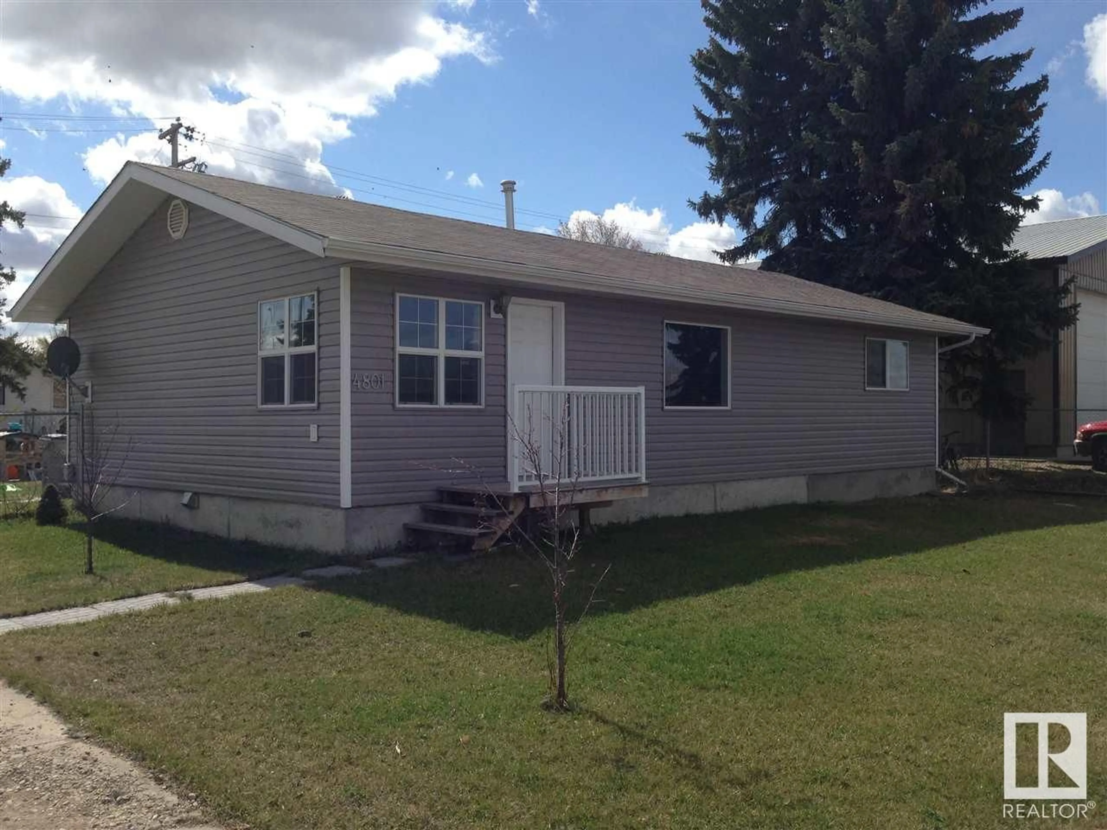 Home with vinyl exterior material, street for 4801 50 AVE, Thorsby Alberta T0C2P0