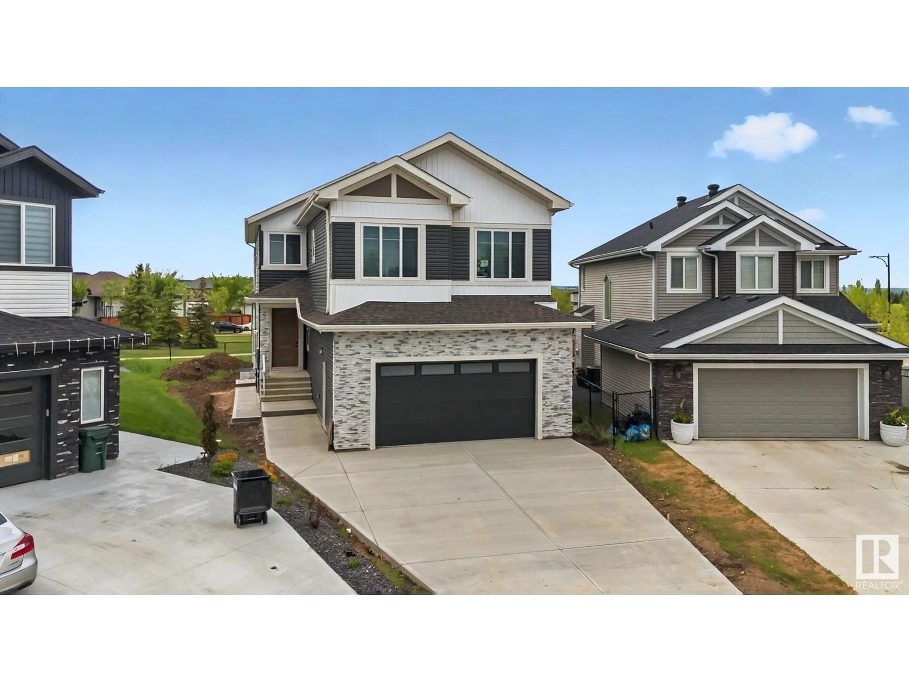 Home with vinyl exterior material, street for 297 NELSON DR, Spruce Grove Alberta T7X0T8