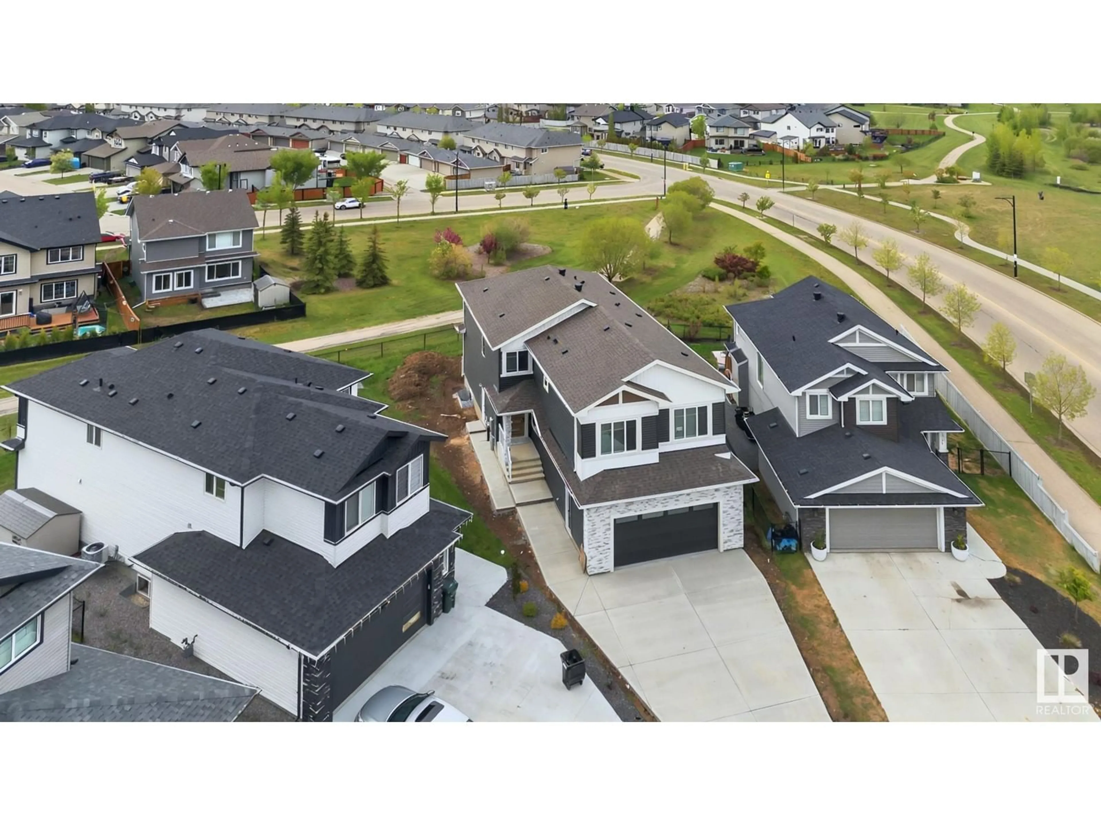 A pic from outside/outdoor area/front of a property/back of a property/a pic from drone, street for 297 NELSON DR, Spruce Grove Alberta T7X0T8