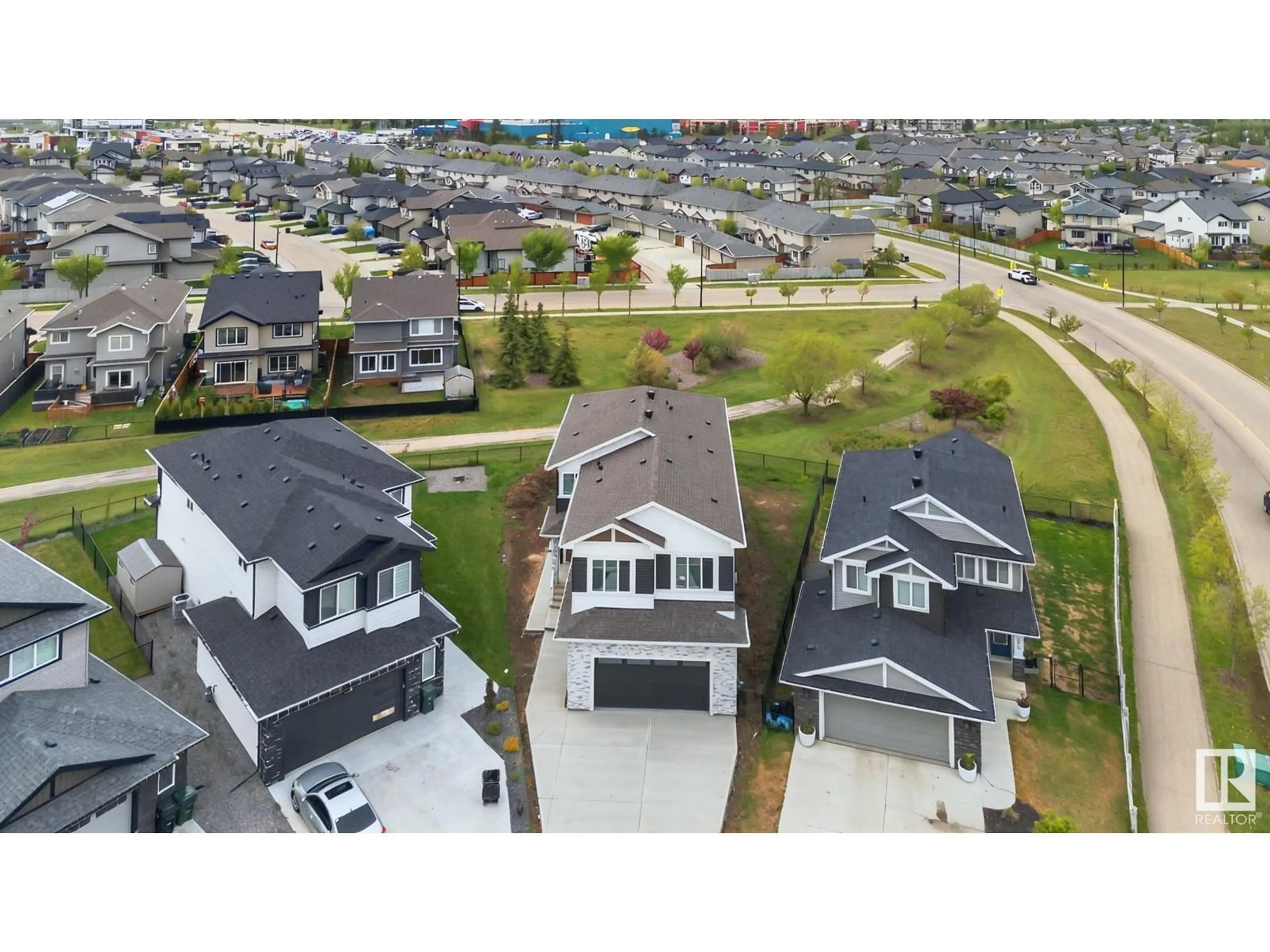 A pic from outside/outdoor area/front of a property/back of a property/a pic from drone, street for 297 NELSON DR, Spruce Grove Alberta T7X0T8