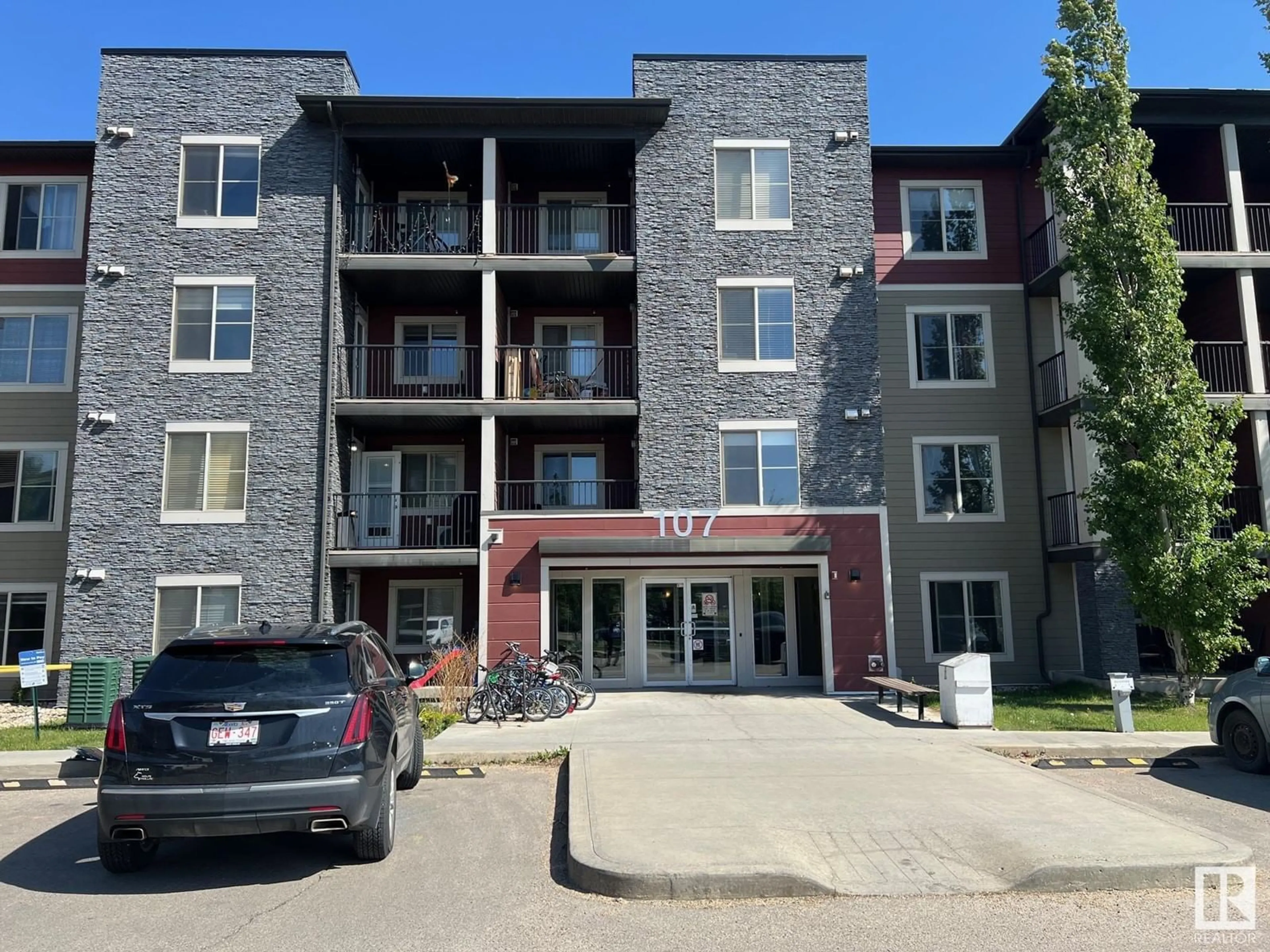 A pic from outside/outdoor area/front of a property/back of a property/a pic from drone, building for #101 - 107 WATT CM, Edmonton Alberta T6X2C6