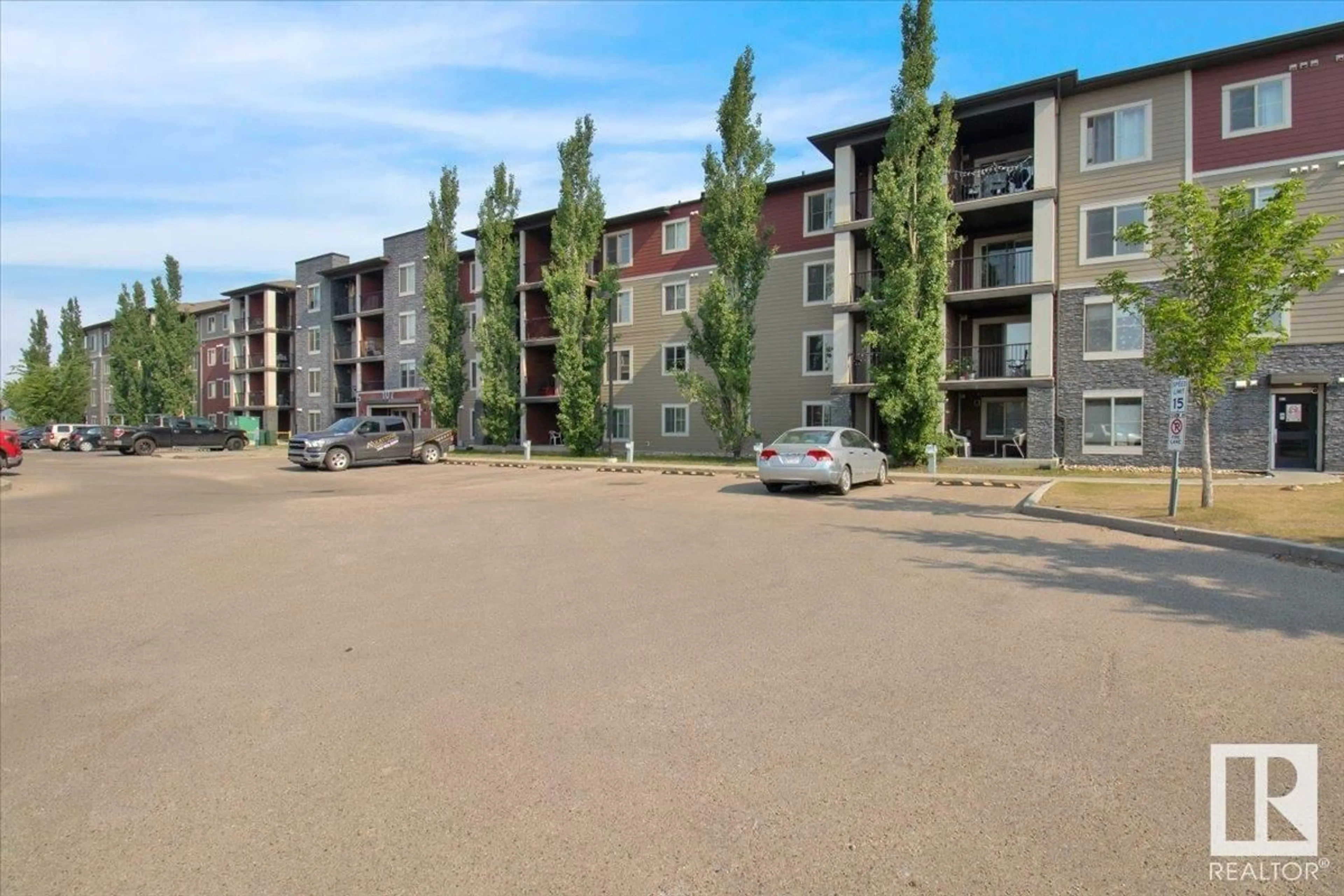 A pic from outside/outdoor area/front of a property/back of a property/a pic from drone, street for #101 - 107 WATT CM, Edmonton Alberta T6X2C6