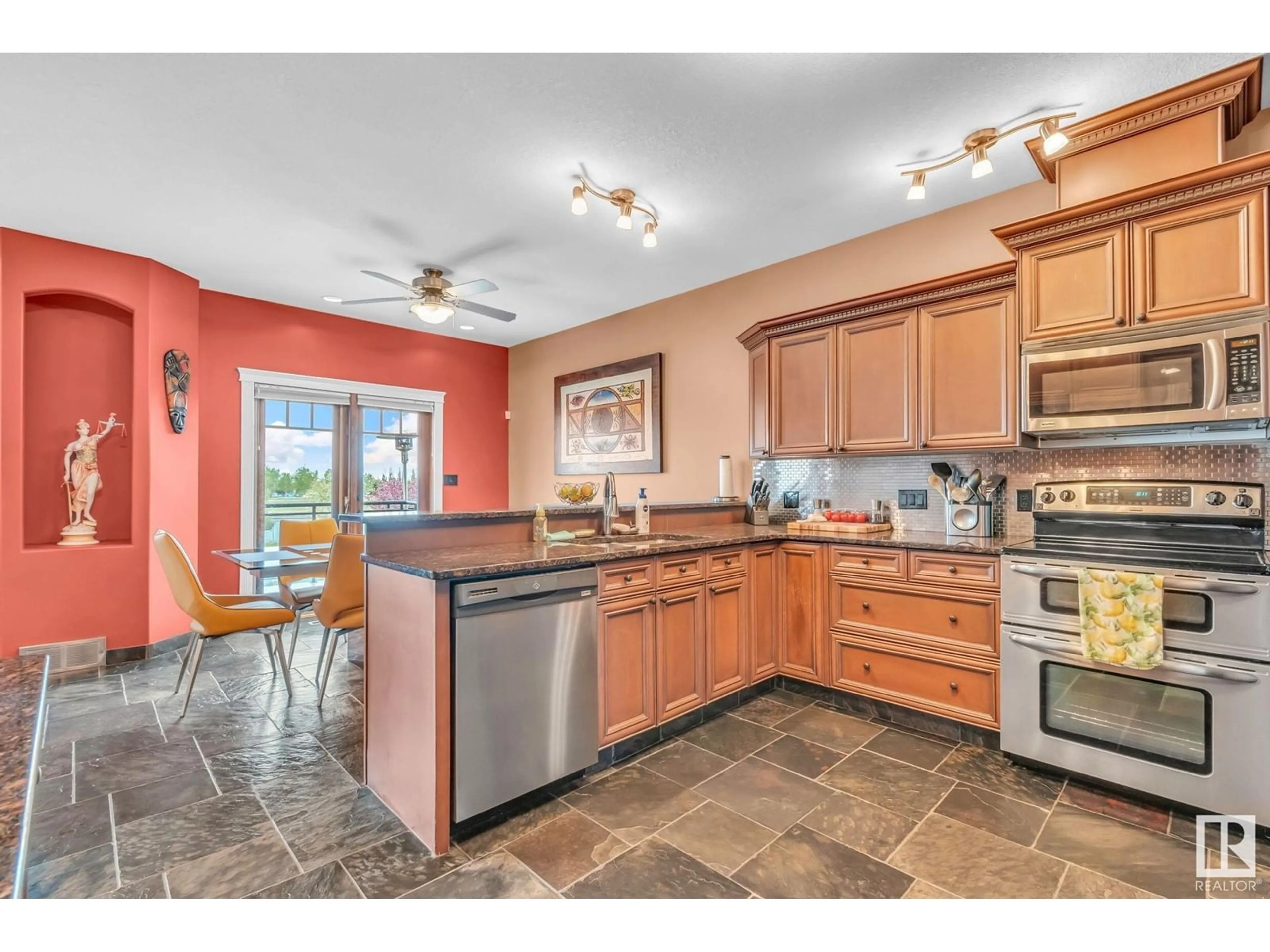 Open concept kitchen, ceramic/tile floor for 8069 166A AV, Edmonton Alberta T5Z3W1