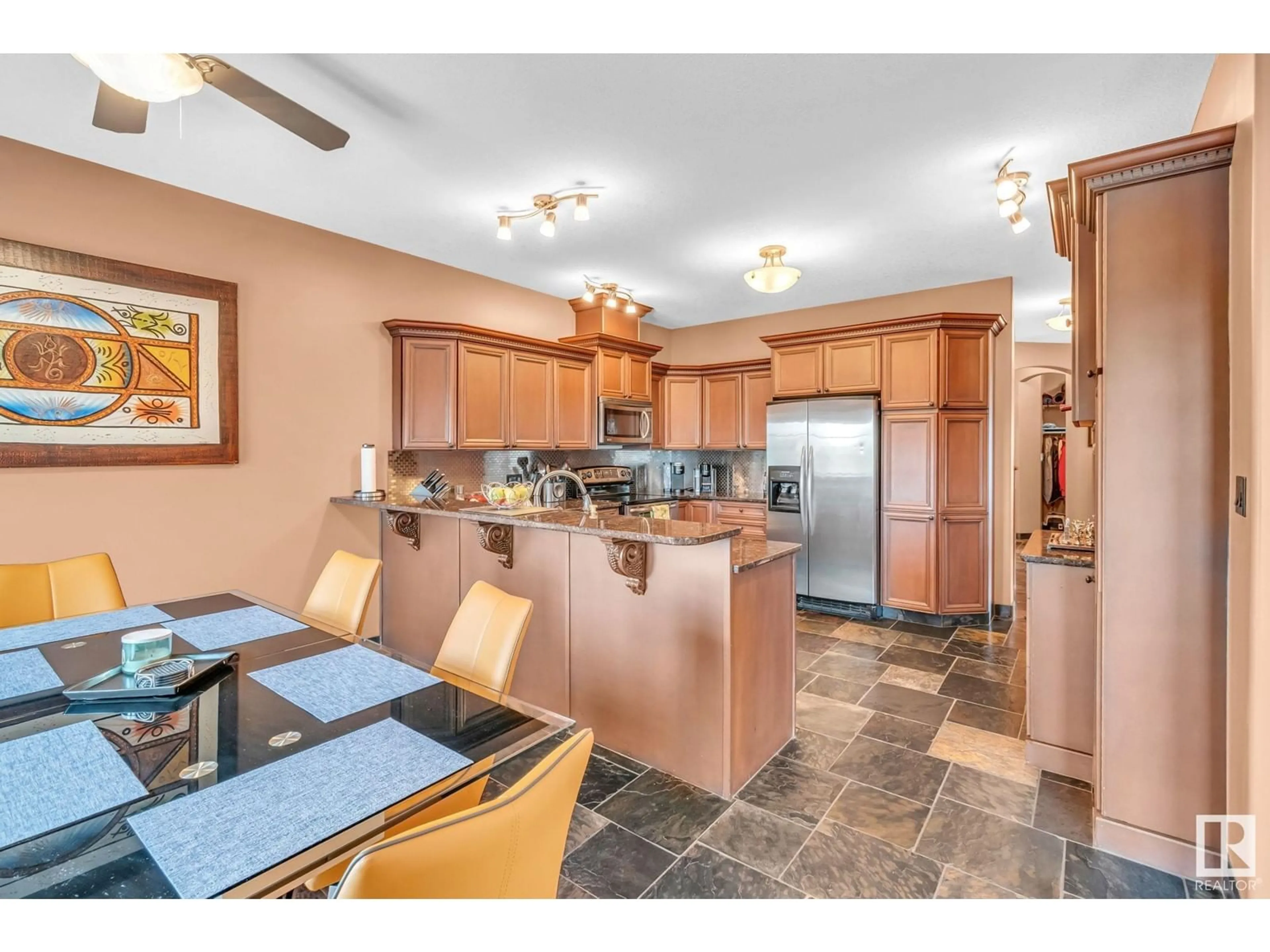 Open concept kitchen, ceramic/tile floor for 8069 166A AV, Edmonton Alberta T5Z3W1