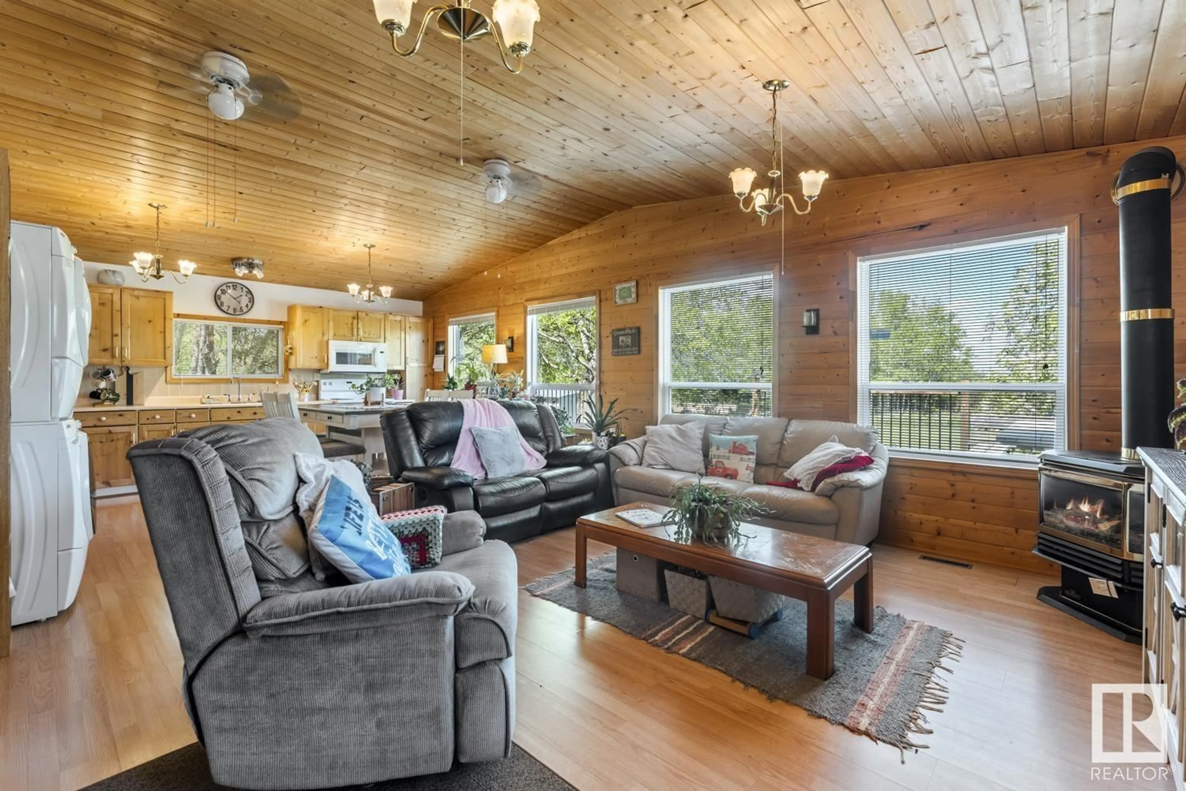 Living room with furniture, wood/laminate floor for 36 45522 TWP RD 593A, Rural Bonnyville M.D. Alberta T9N2J6