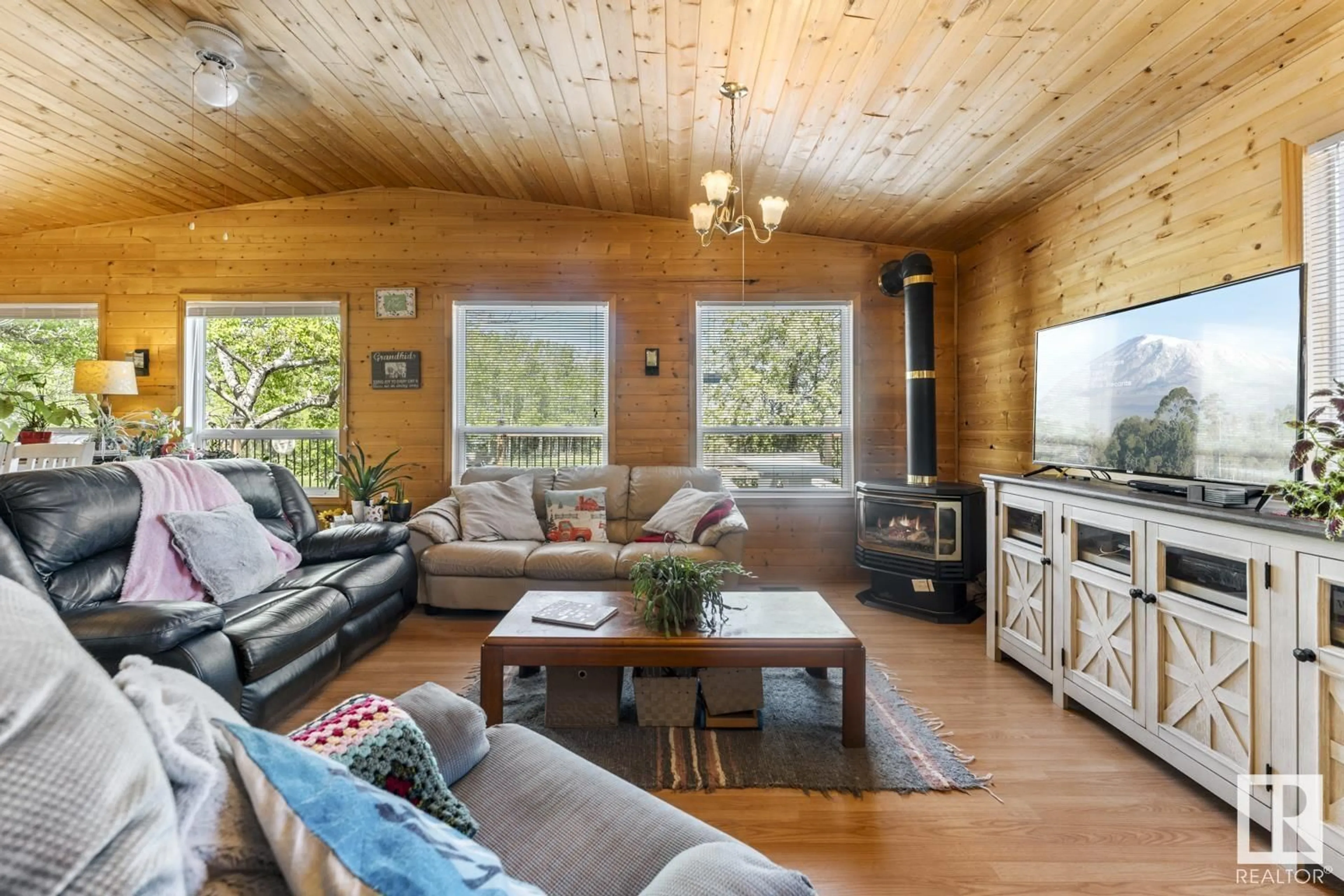 Living room with furniture, wood/laminate floor for 36 45522 TWP RD 593A, Rural Bonnyville M.D. Alberta T9N2J6