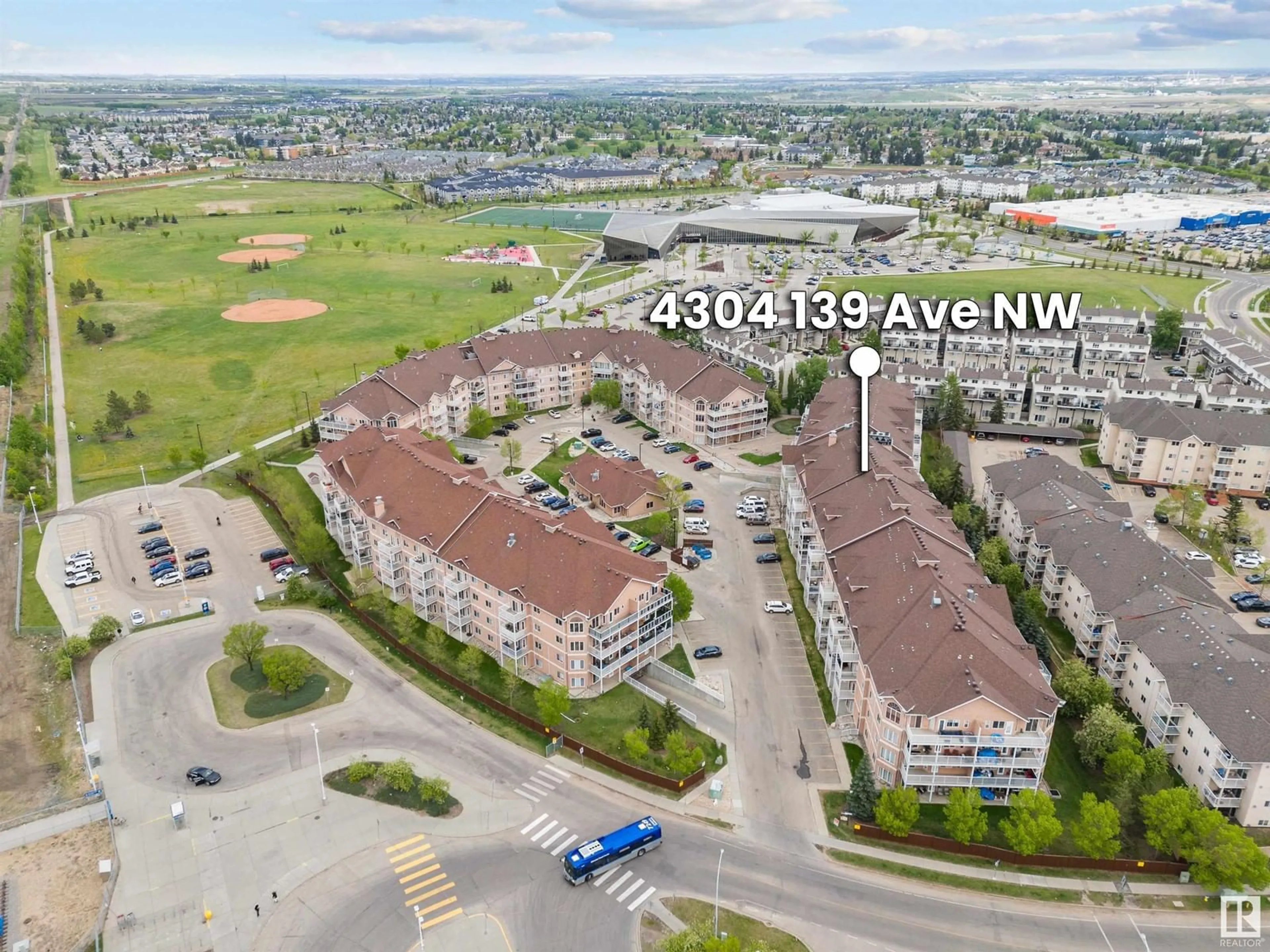 A pic from outside/outdoor area/front of a property/back of a property/a pic from drone, mountain view for 4304 - 225 139 AV, Edmonton Alberta T5Y0H6