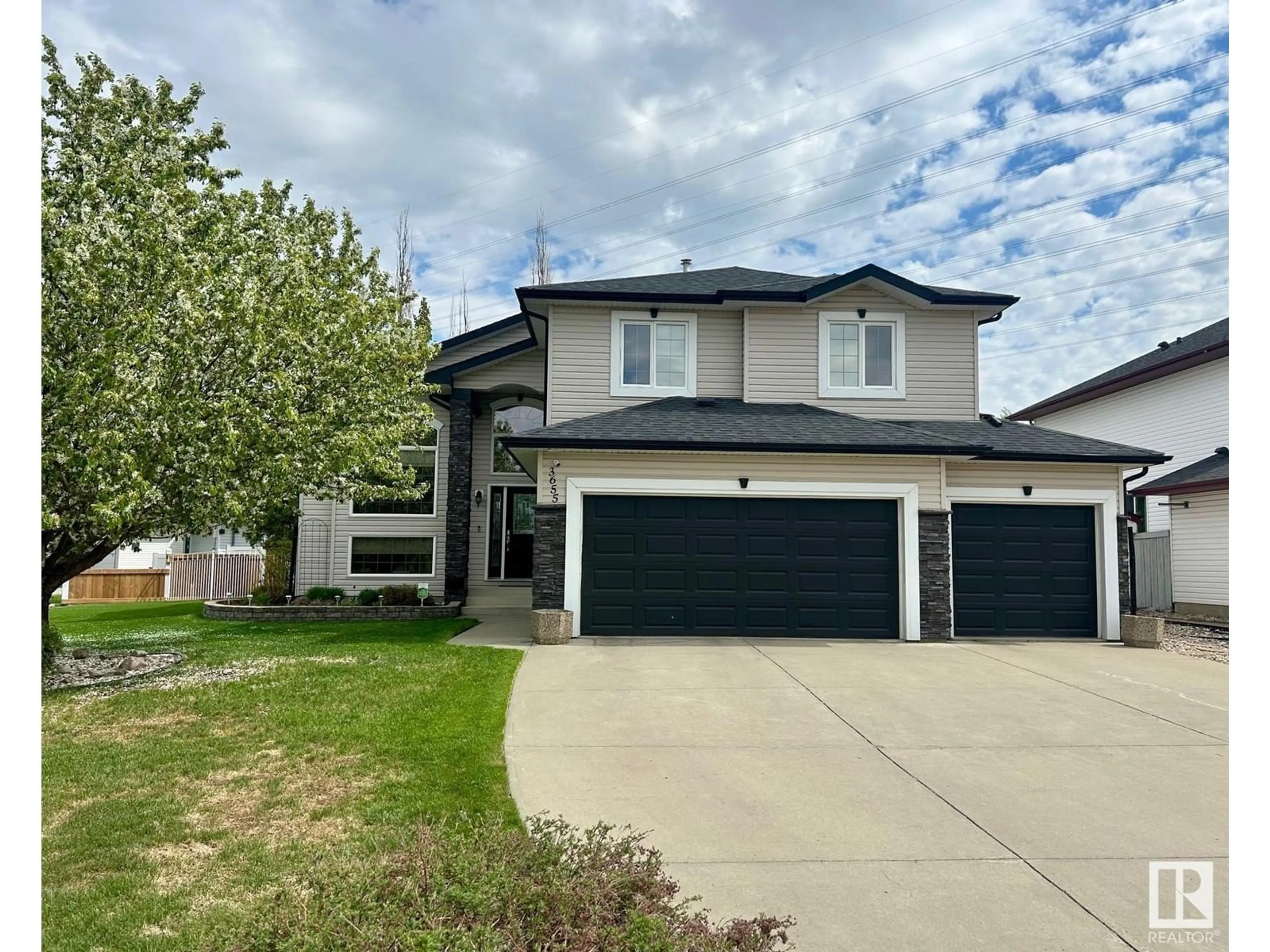 Home with vinyl exterior material, street for NW - 3655 28 ST, Edmonton Alberta T4T1N4