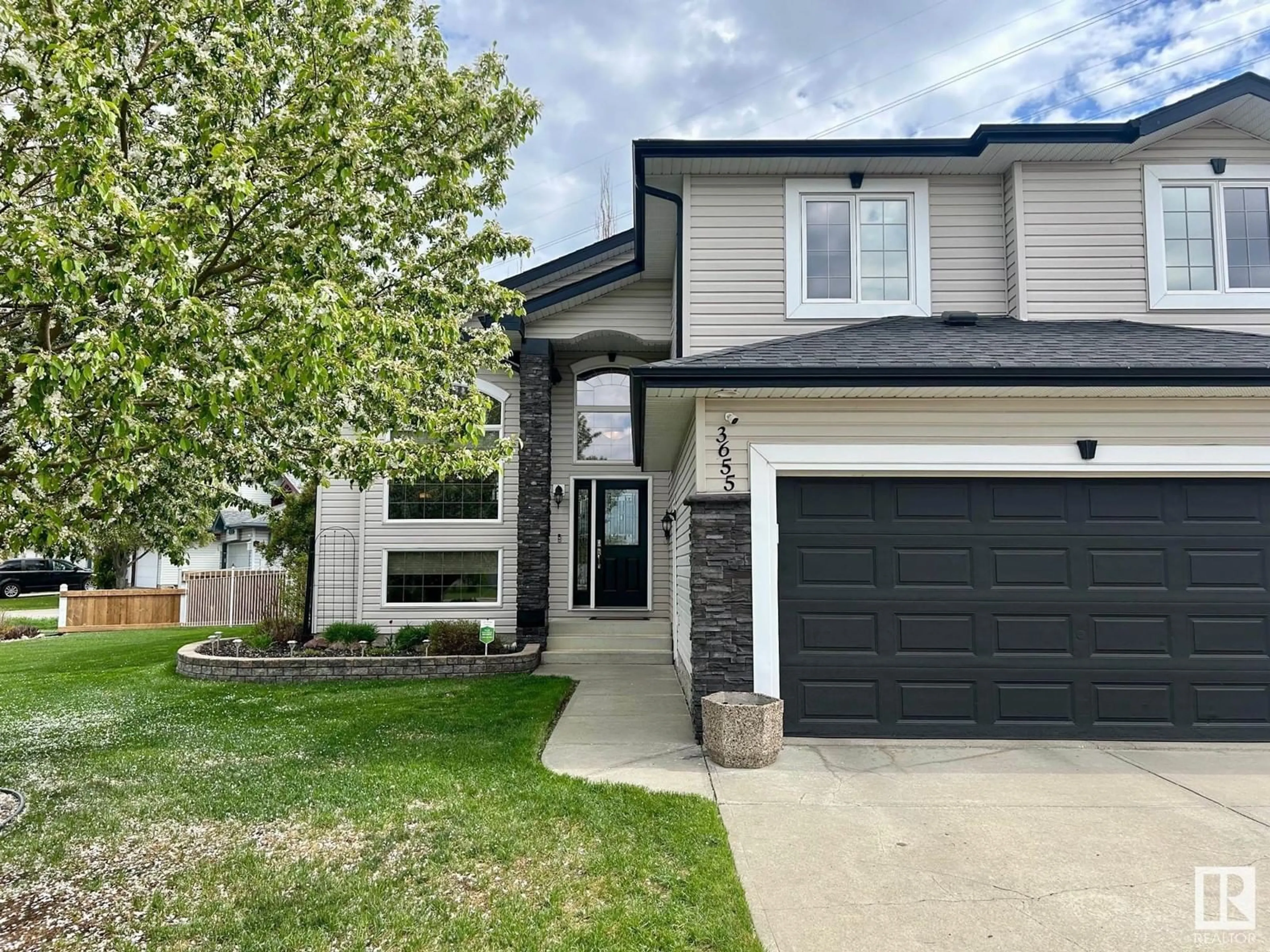 Home with vinyl exterior material, street for NW - 3655 28 ST, Edmonton Alberta T4T1N4