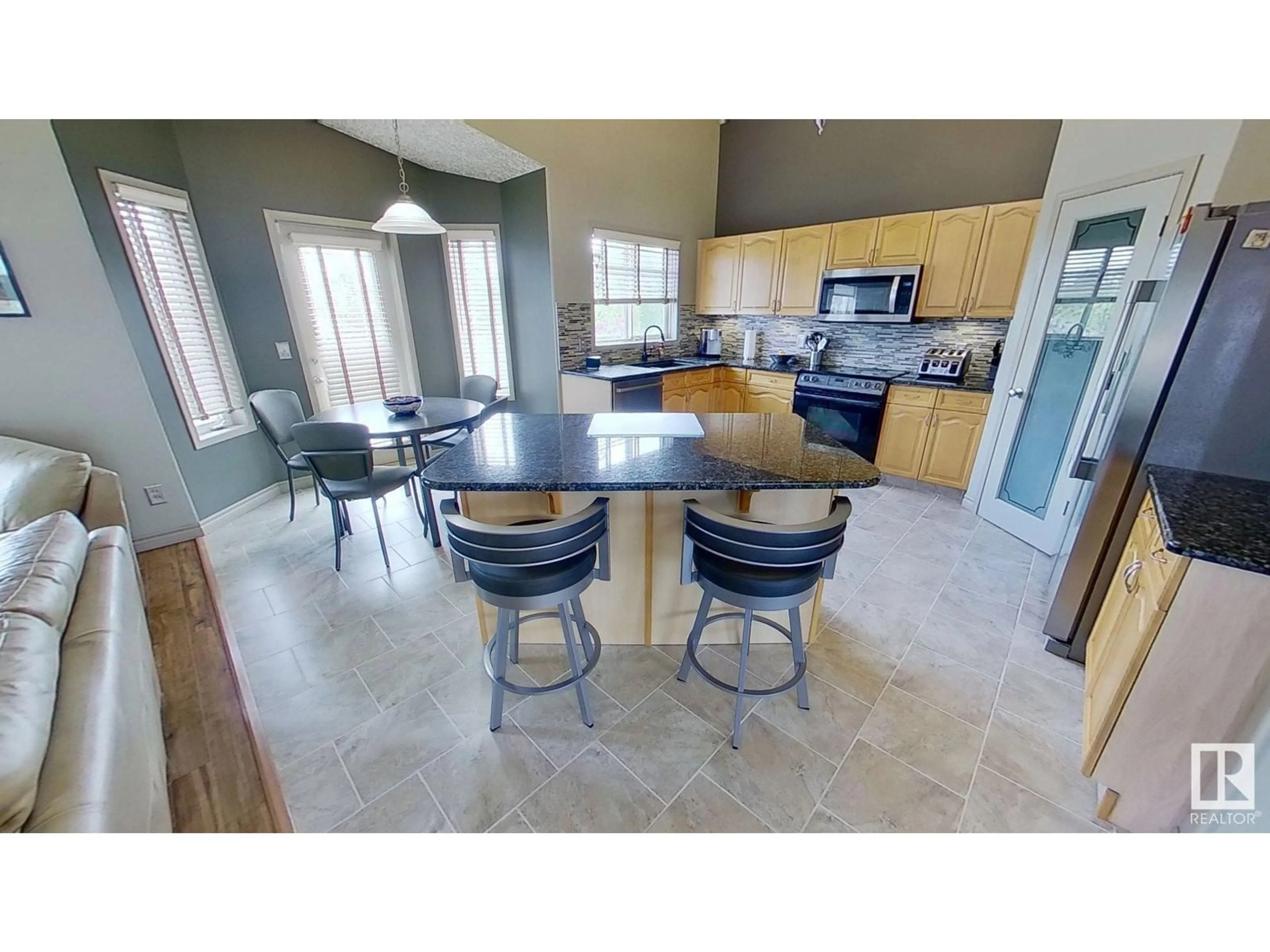Open concept kitchen, ceramic/tile floor for NW - 3655 28 ST, Edmonton Alberta T4T1N4