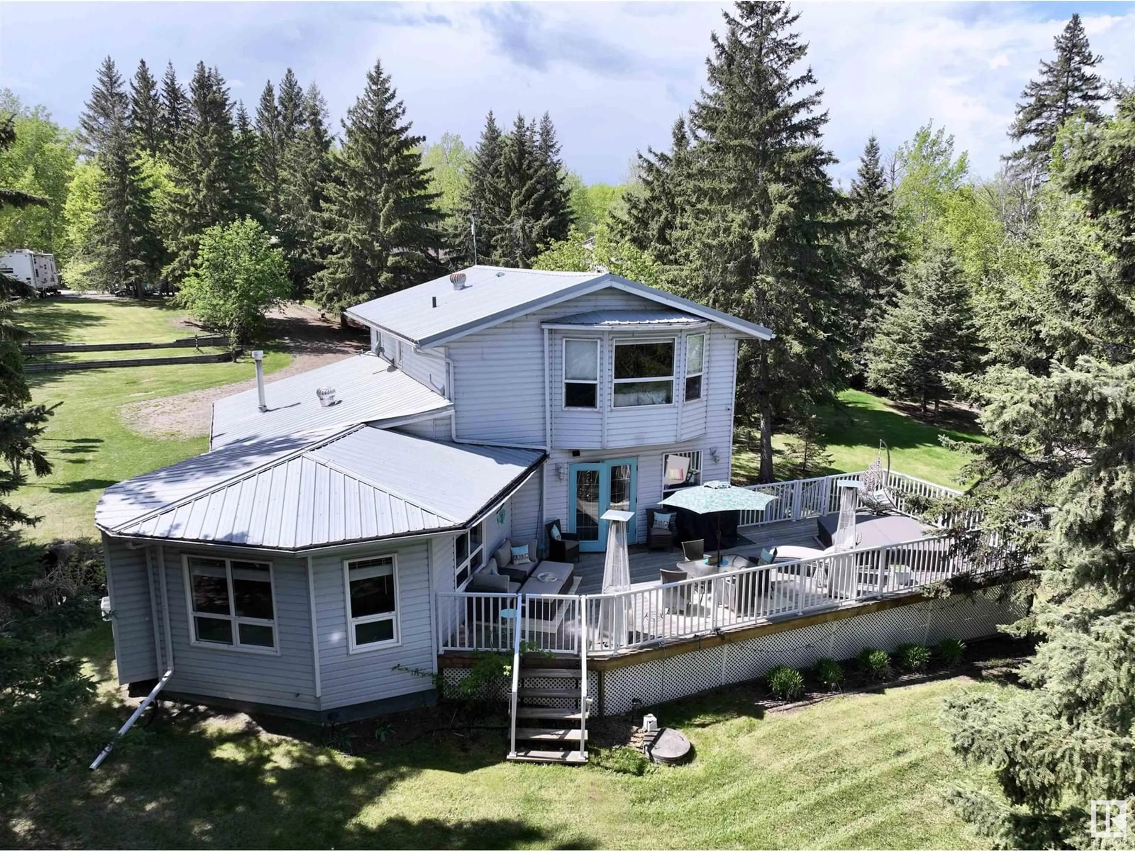 A pic from outside/outdoor area/front of a property/back of a property/a pic from drone, unknown for 60501 - 316 RR 120, Rural St. Paul County Alberta T0A3E0