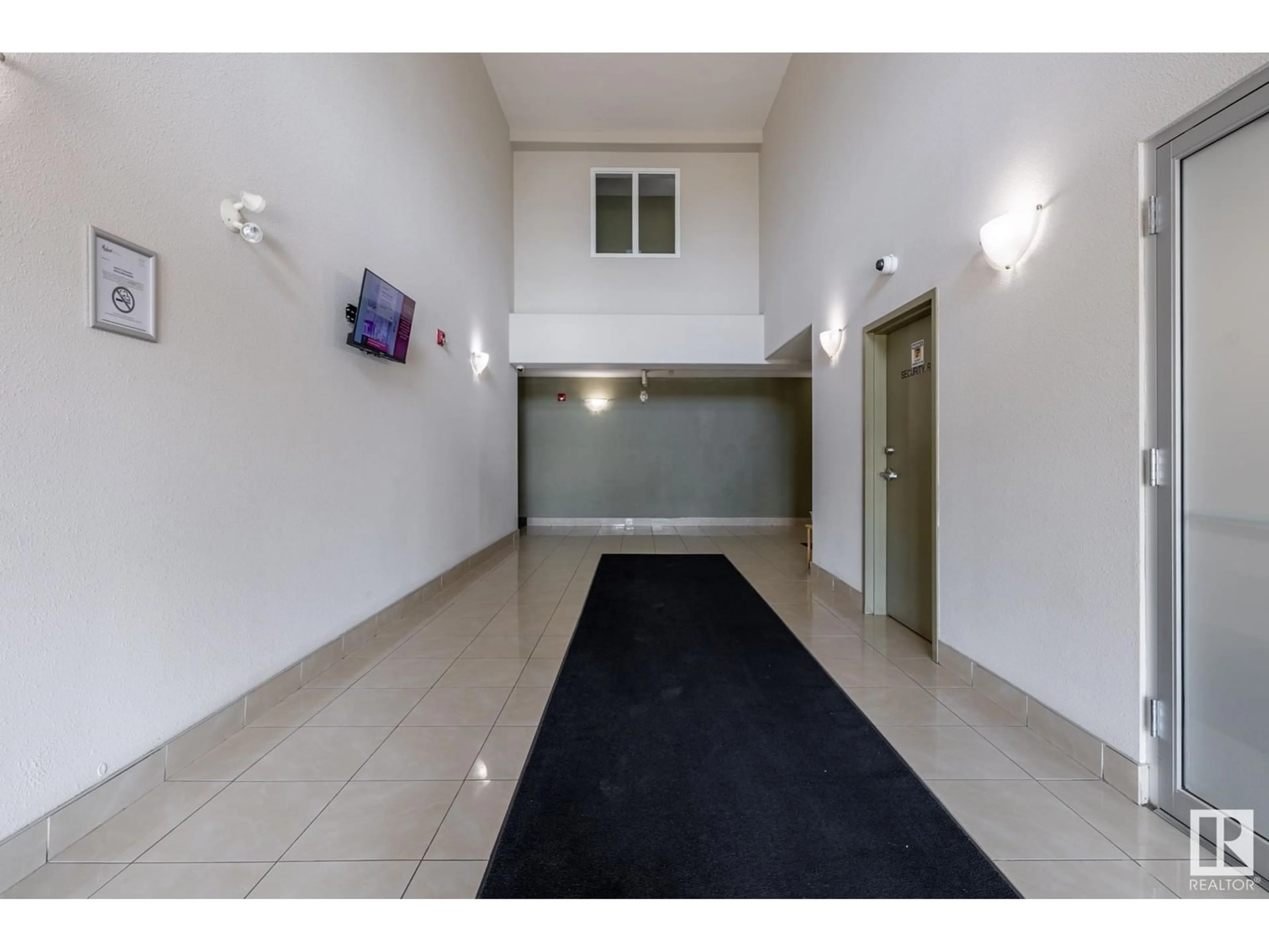 Indoor foyer for #219 - 240 SPRUCE RIDGE RD, Spruce Grove Alberta T7X0G5