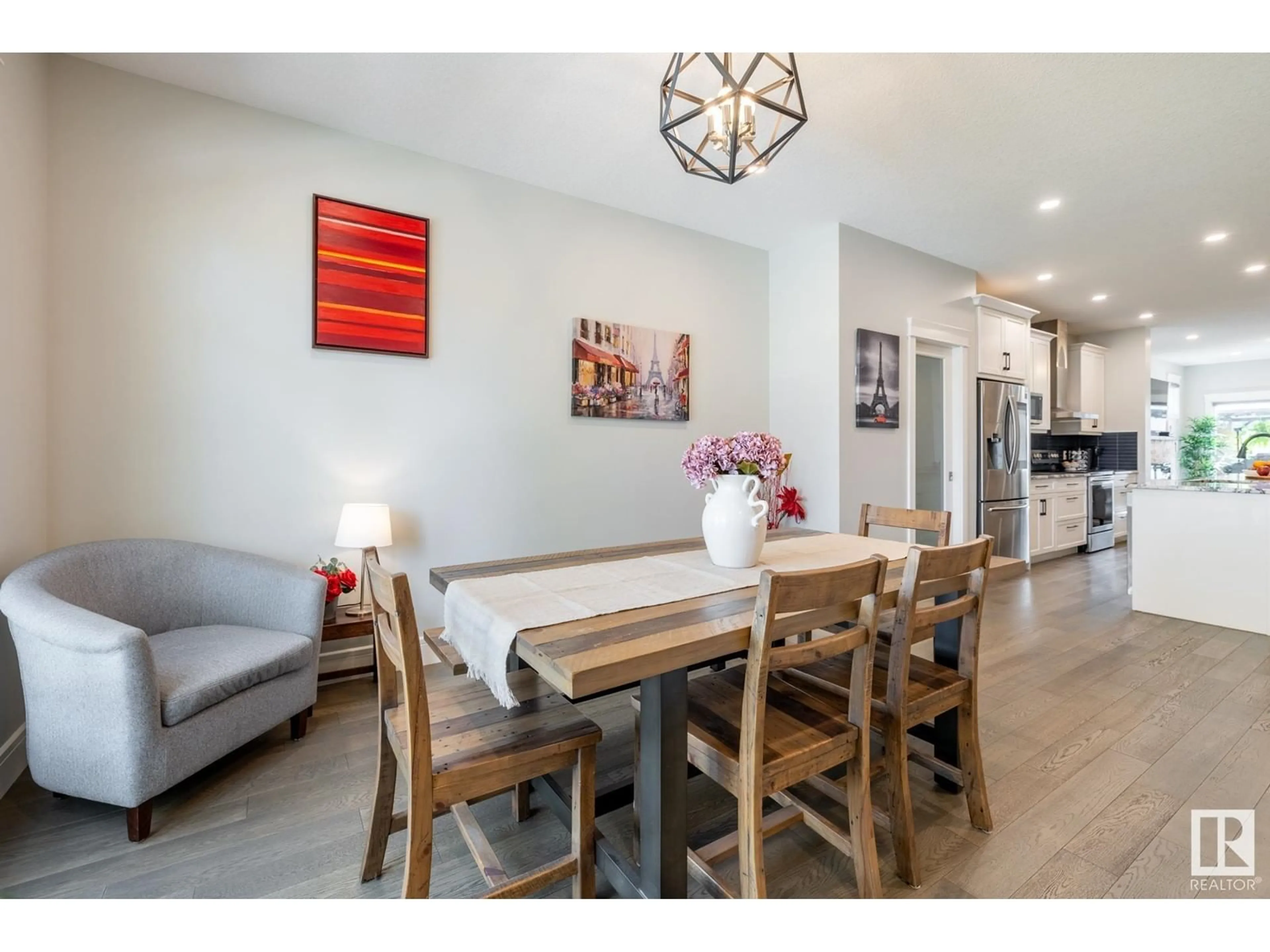 Dining room, wood/laminate floor for 7727 83 AV, Edmonton Alberta T6C1A2