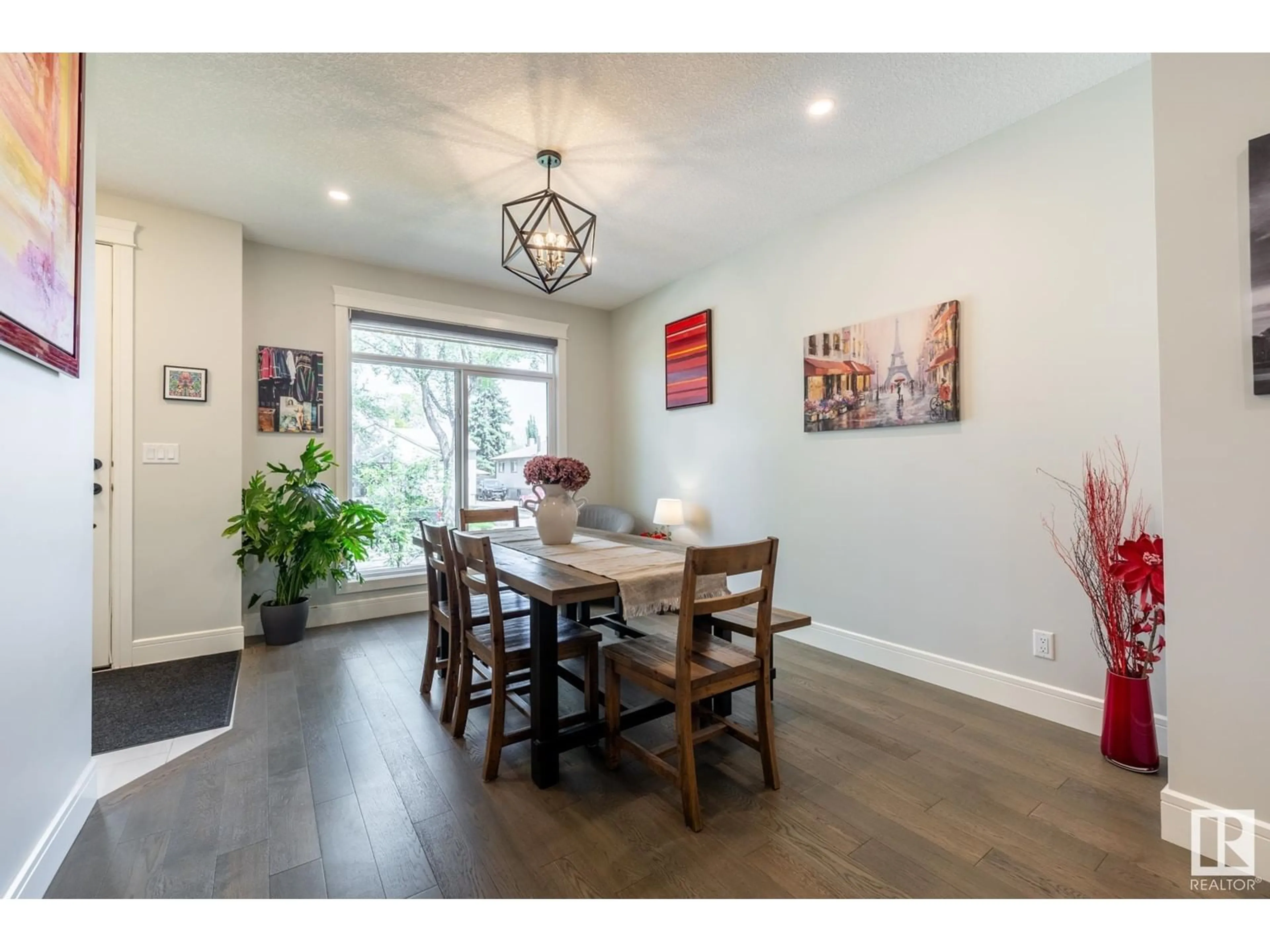 Dining room, wood/laminate floor for 7727 83 AV, Edmonton Alberta T6C1A2