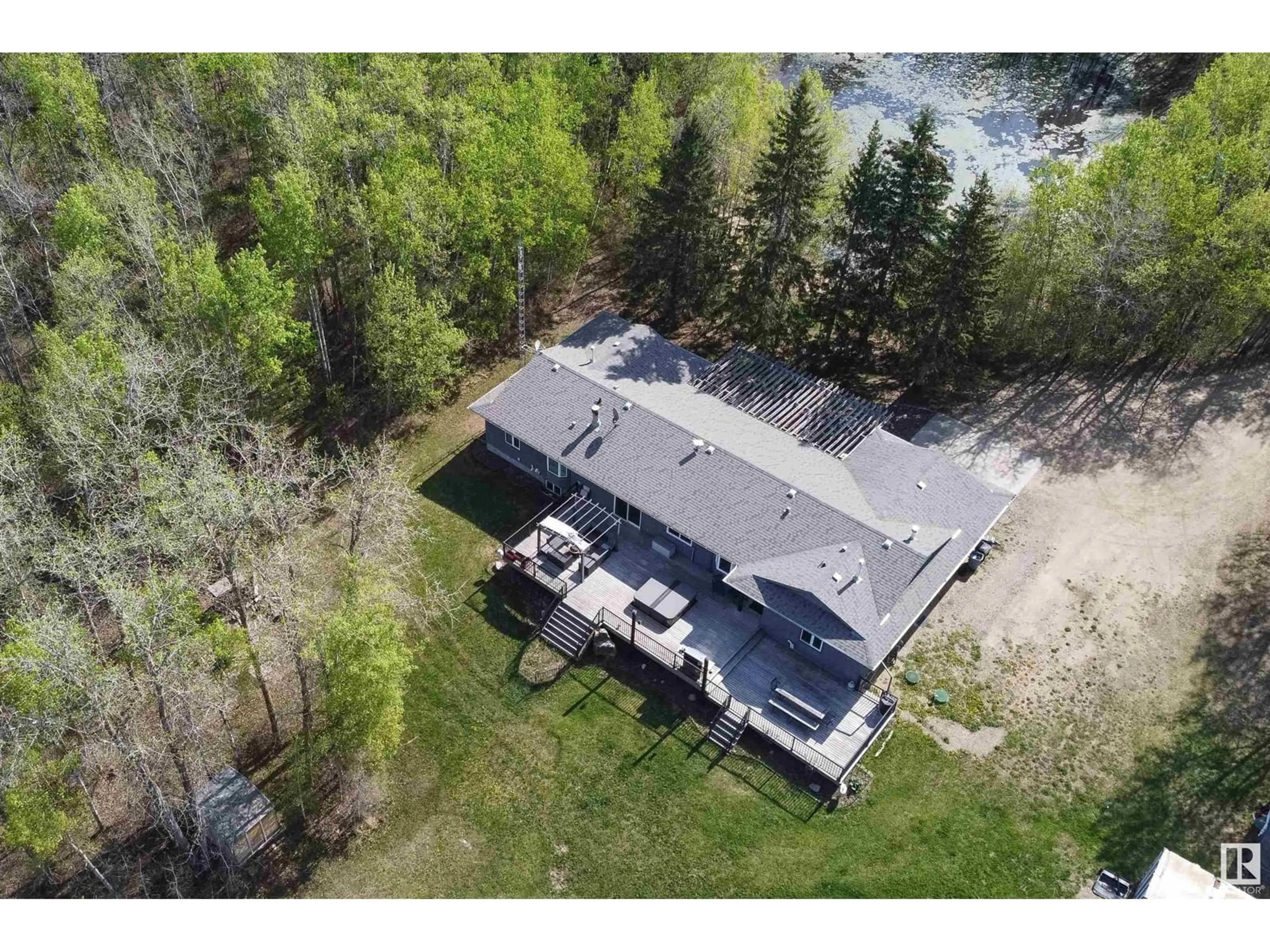 A pic from outside/outdoor area/front of a property/back of a property/a pic from drone, water/lake/river/ocean view for #26 - 21357 WYE RD, Rural Strathcona County Alberta T8G1E2
