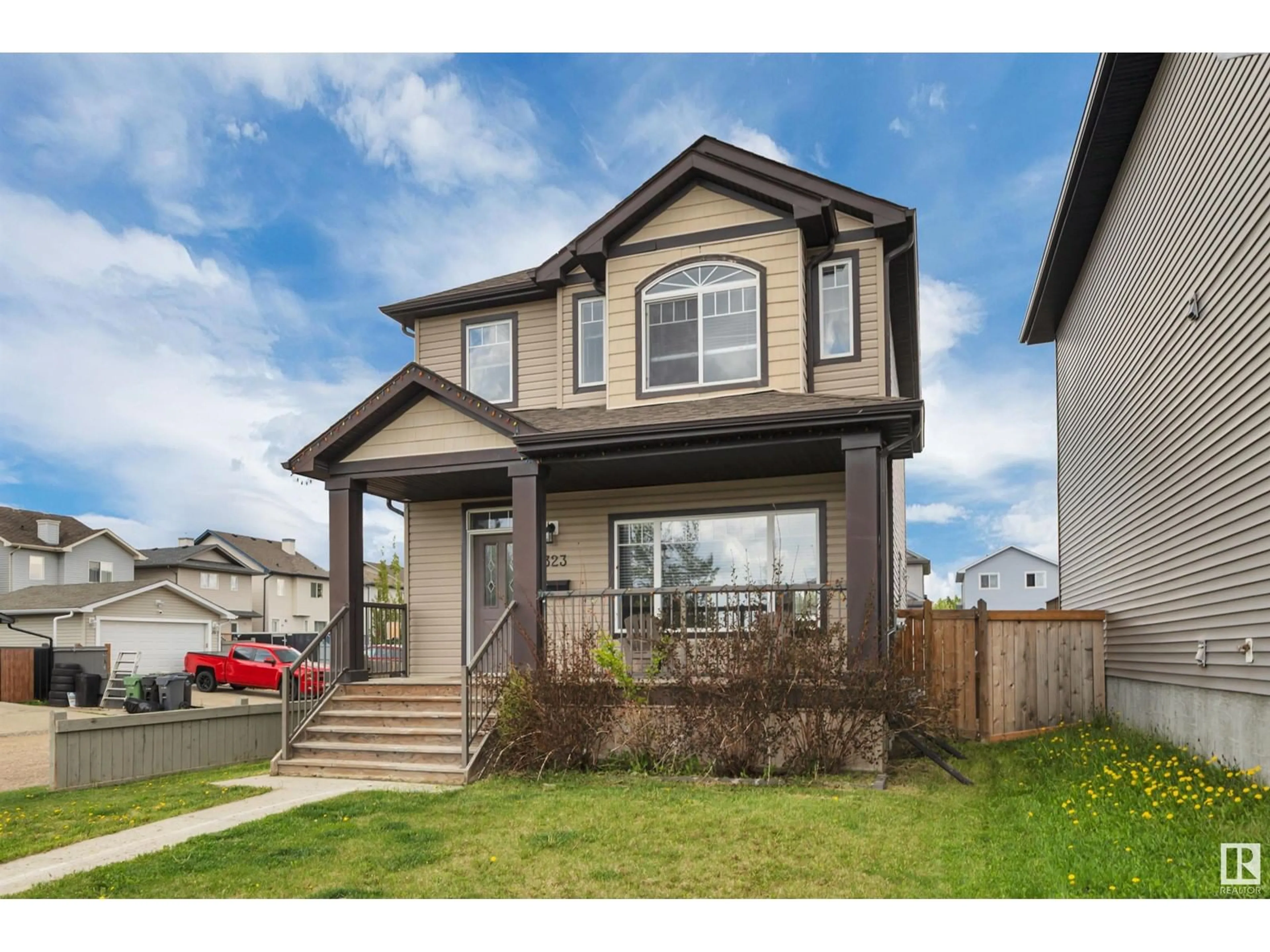 Home with vinyl exterior material, street for 323 SHERIDAN WY, Leduc Alberta T9E8R9