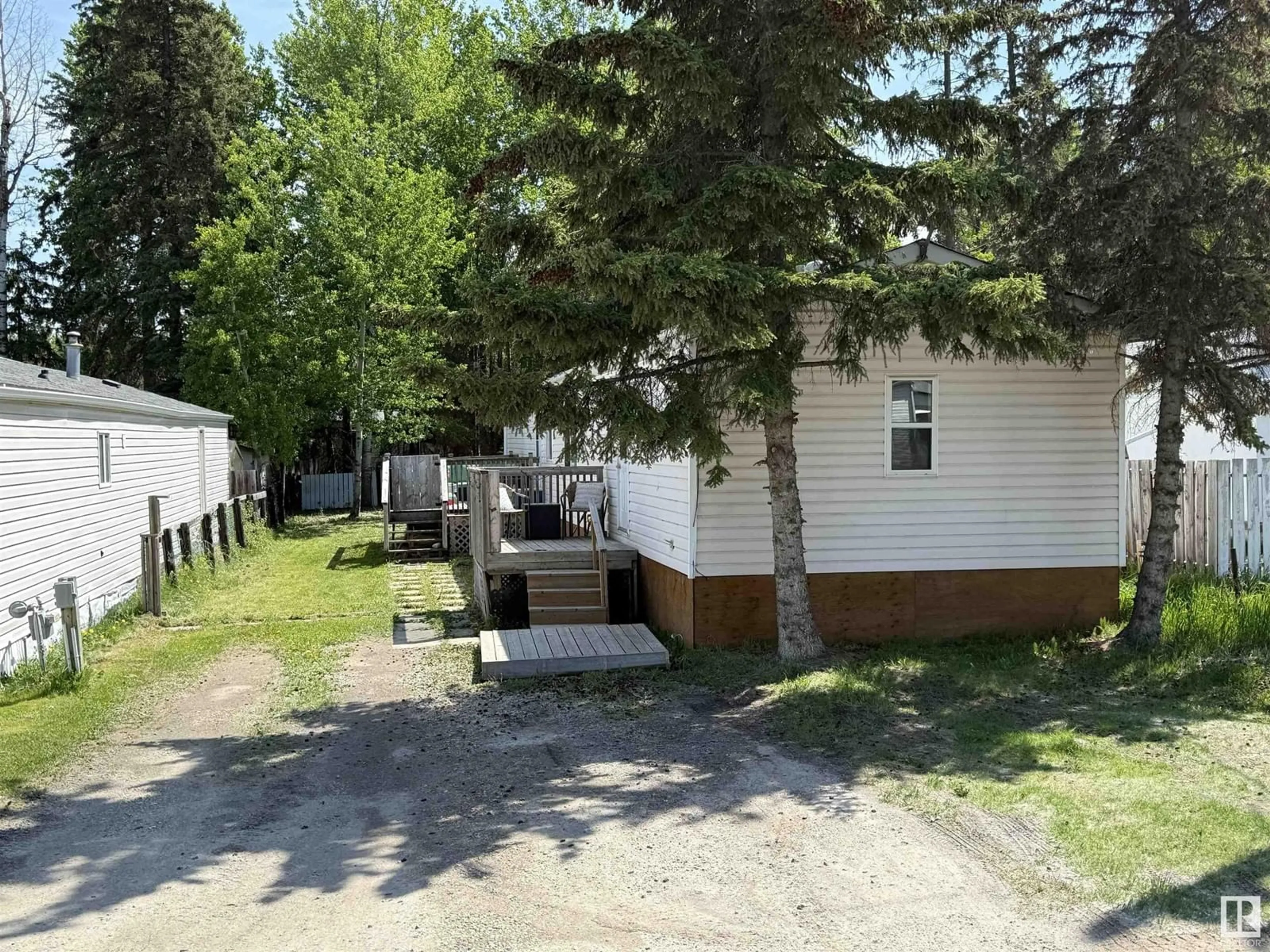 A pic from outside/outdoor area/front of a property/back of a property/a pic from drone, street for 74 GREENWOOD MHP, Drayton Valley Alberta T7A1L4