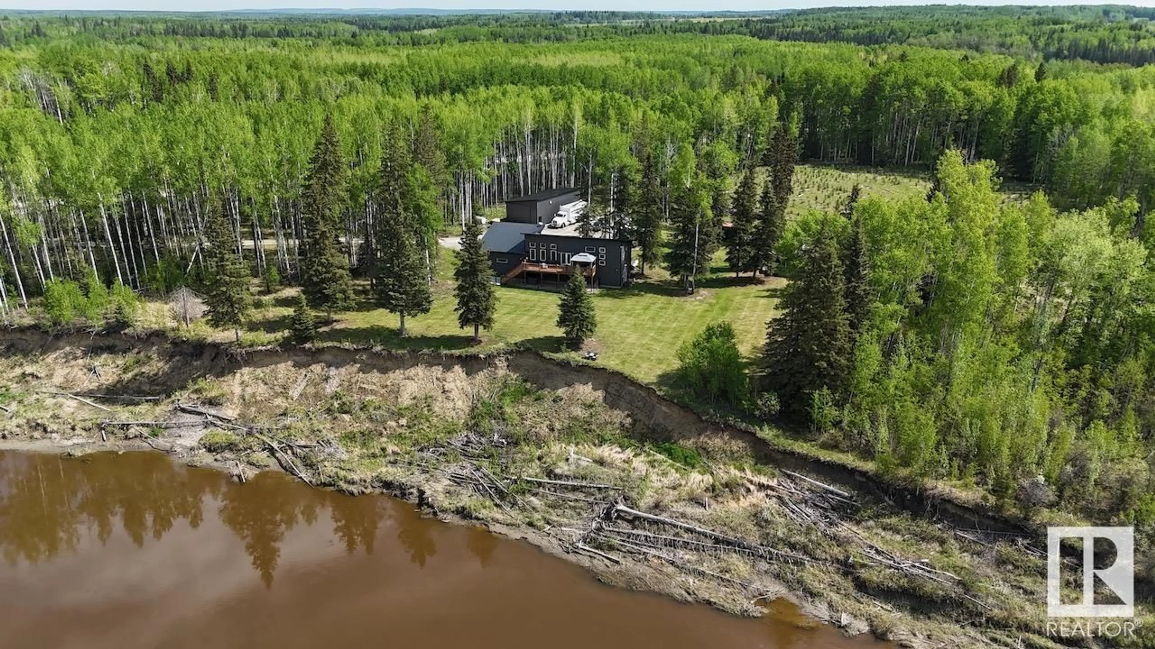 A pic from outside/outdoor area/front of a property/back of a property/a pic from drone, water/lake/river/ocean view for 9013 621 HI, Rural Brazeau County Alberta T7A2A3
