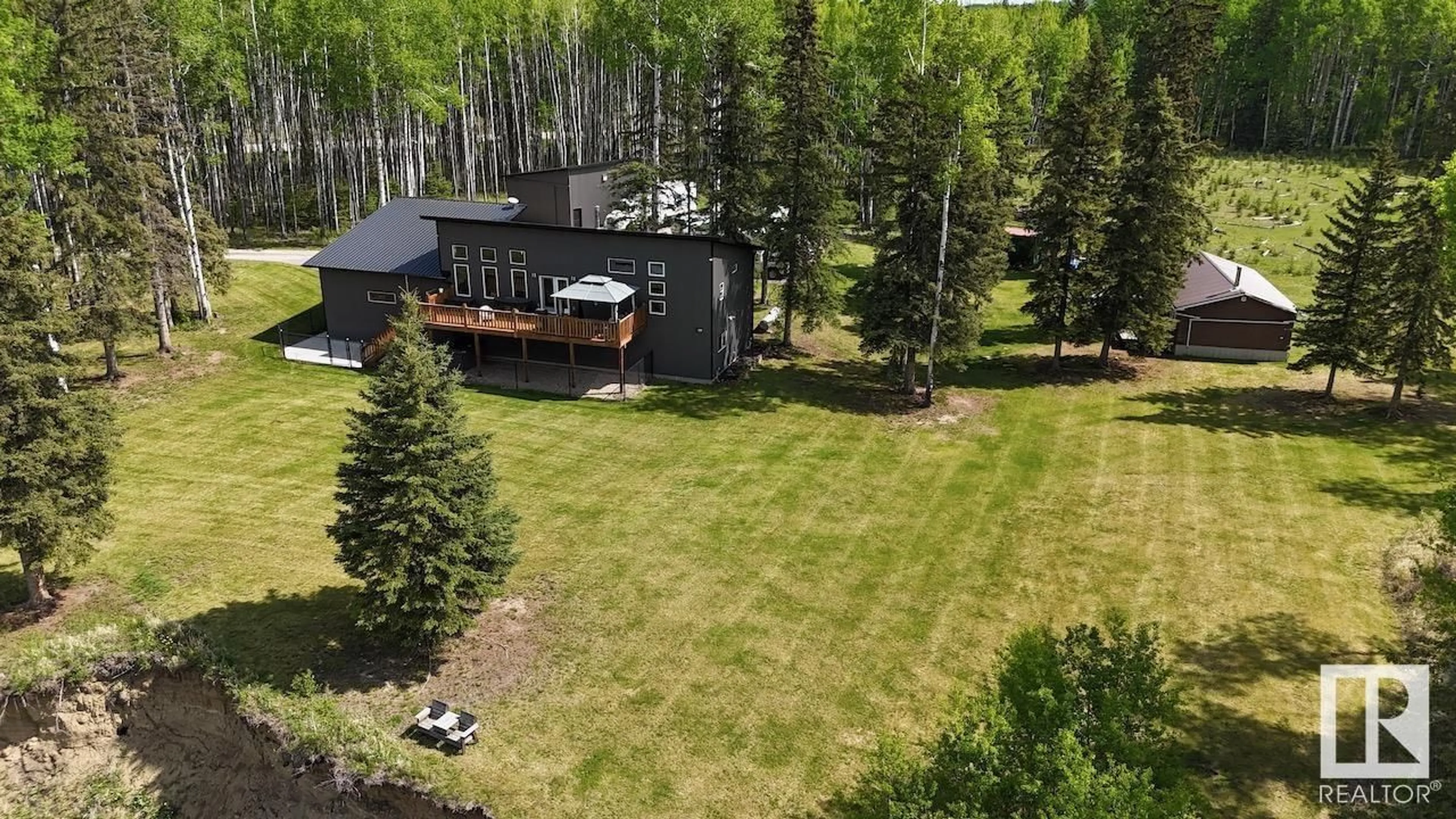 A pic from outside/outdoor area/front of a property/back of a property/a pic from drone, forest/trees view for 9013 621 HI, Rural Brazeau County Alberta T7A2A3