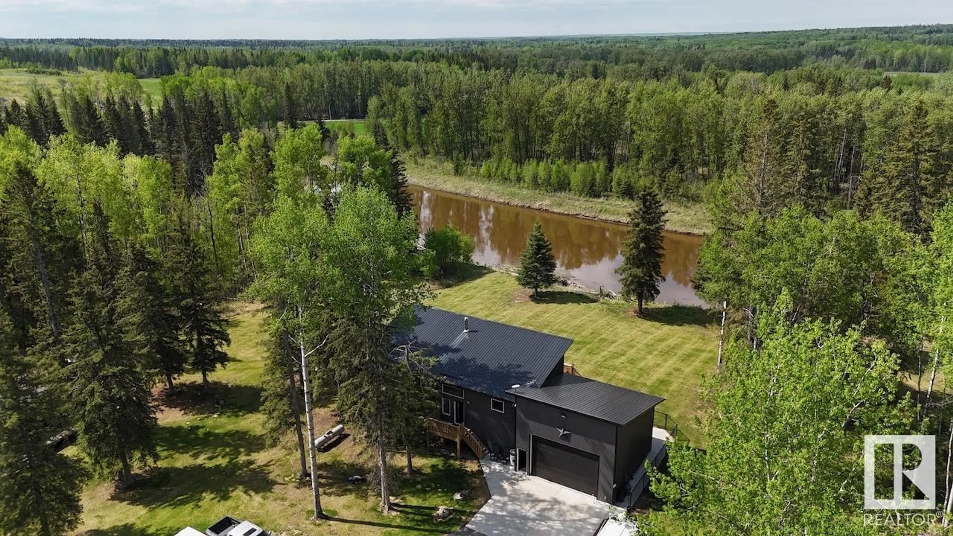 A pic from outside/outdoor area/front of a property/back of a property/a pic from drone, forest/trees view for 9013 621 HI, Rural Brazeau County Alberta T7A2A3