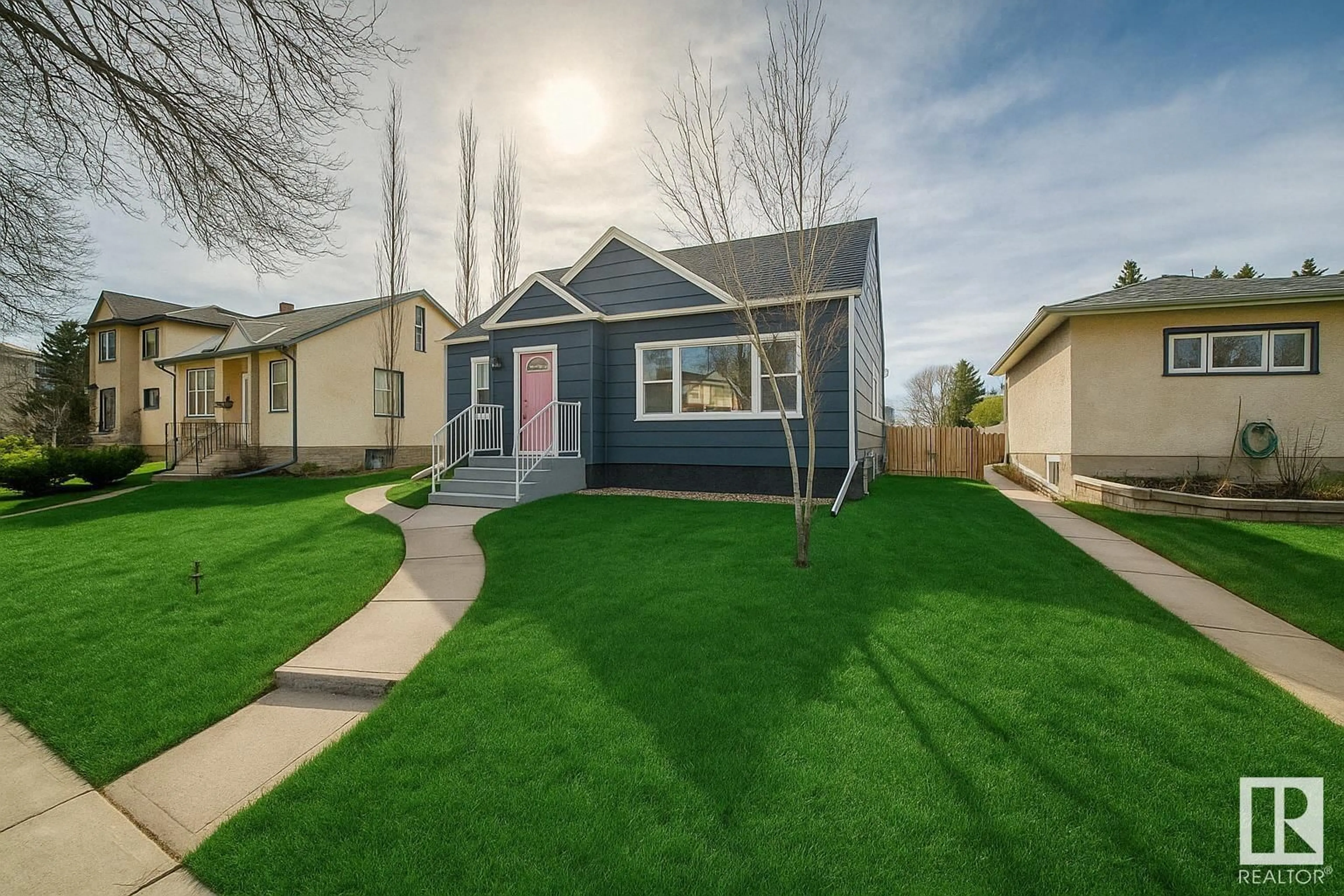 Home with vinyl exterior material, street for NW - 10816 139 ST, Edmonton Alberta T5M1P7