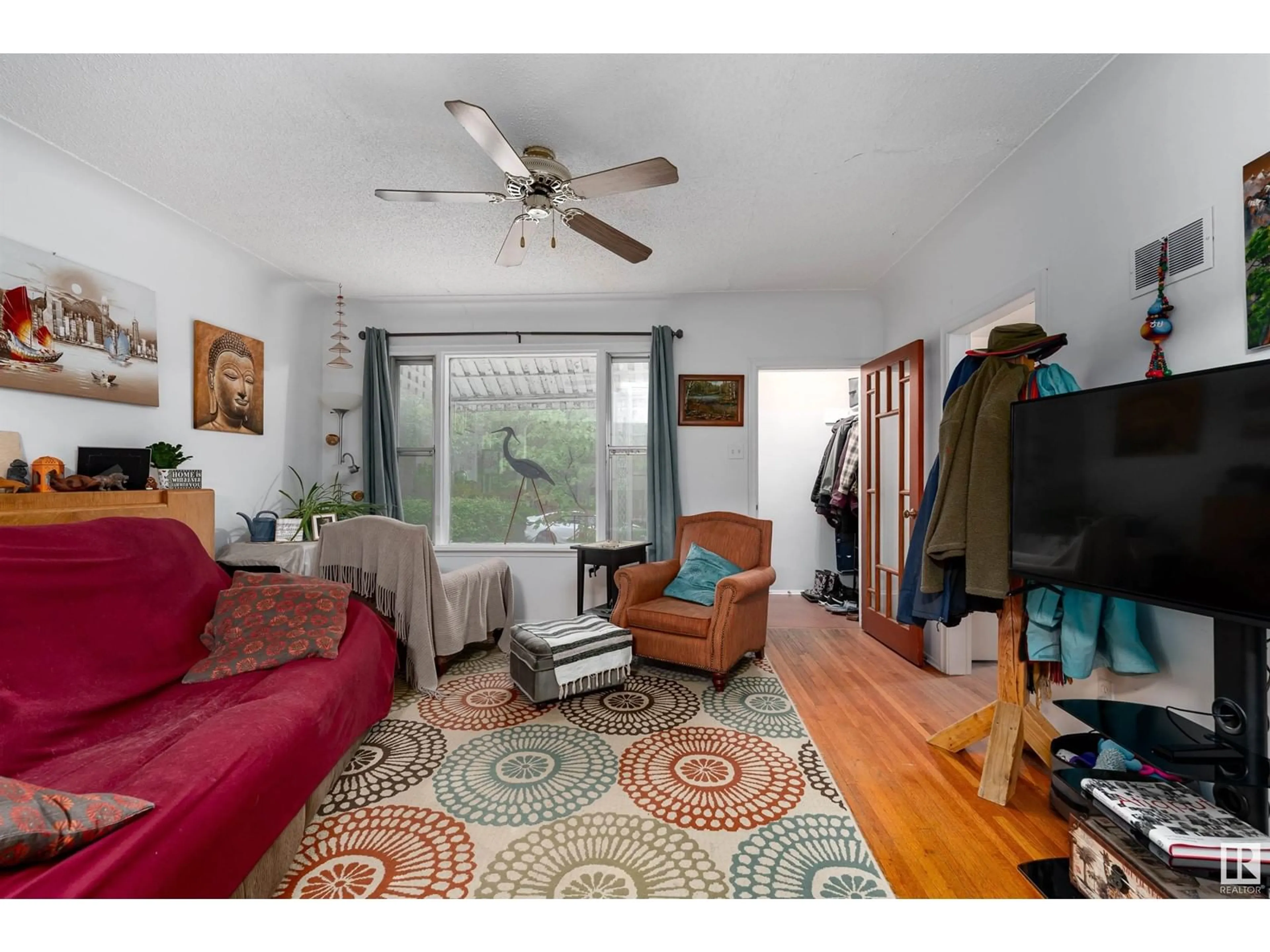 Living room with furniture, unknown for NW - 9334 83 AV, Edmonton Alberta T6C1B8