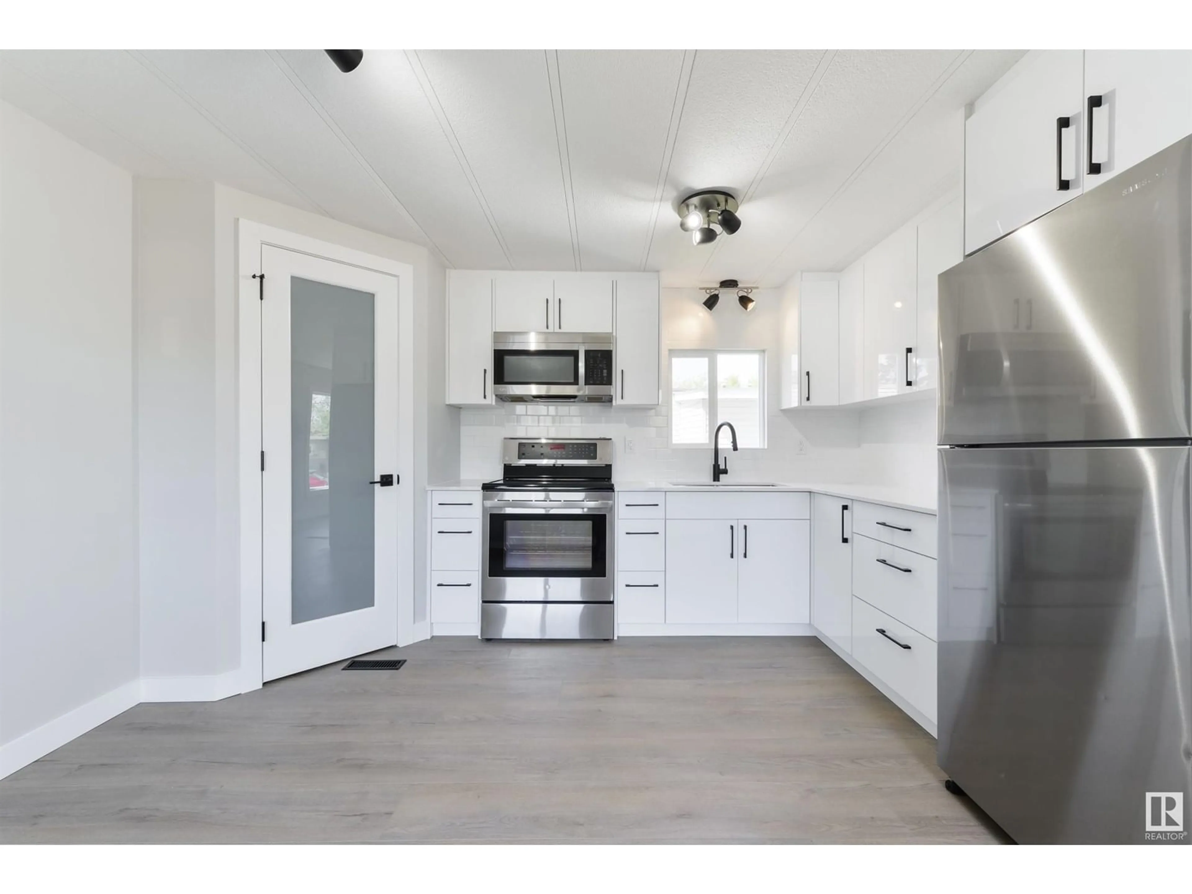 Open concept kitchen, unknown for #100 - 305 CALAHOO RD, Spruce Grove Alberta T7X3K6
