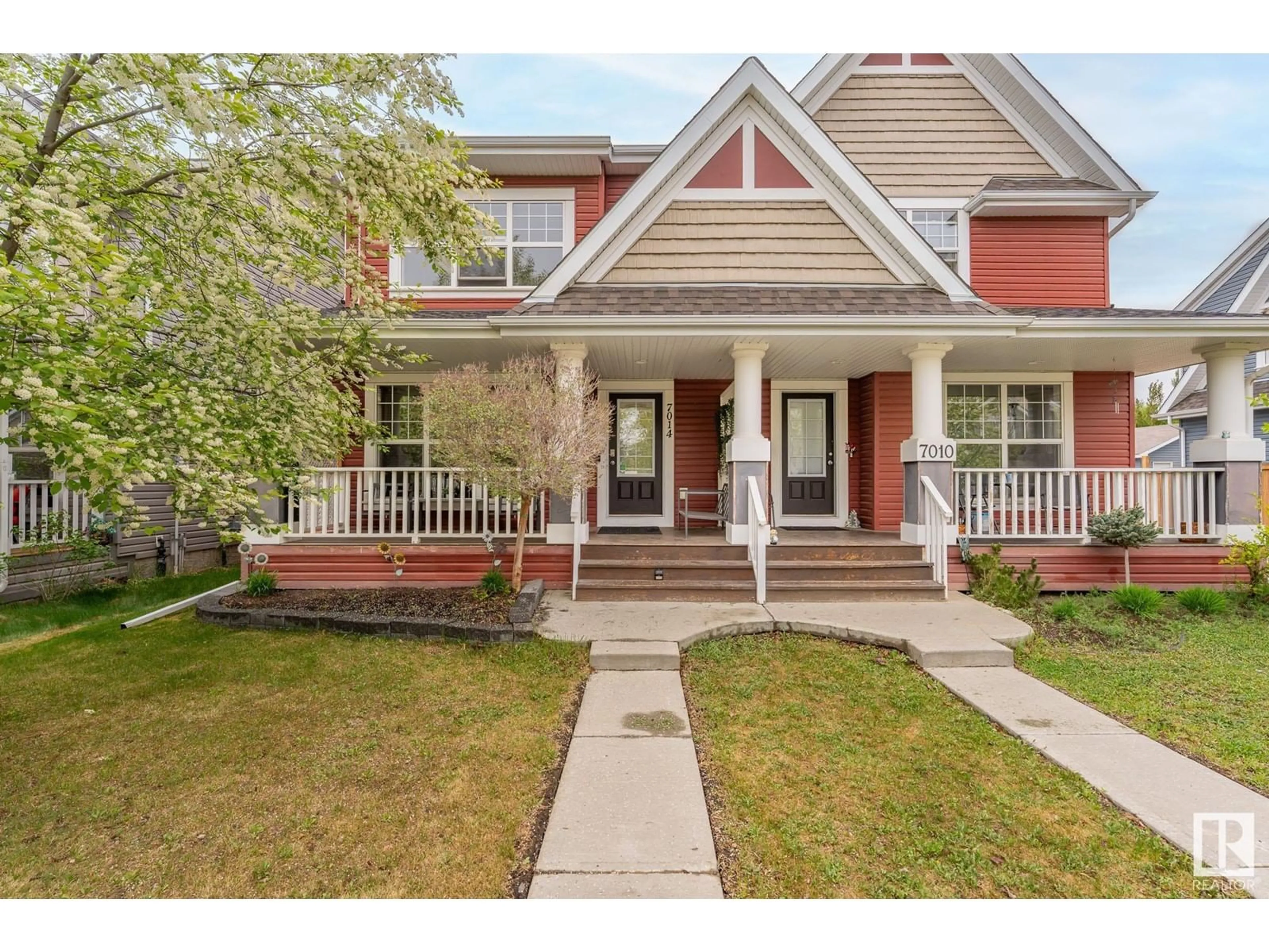 Home with brick exterior material, street for SW - 7014 21A AV, Edmonton Alberta T6X0T7