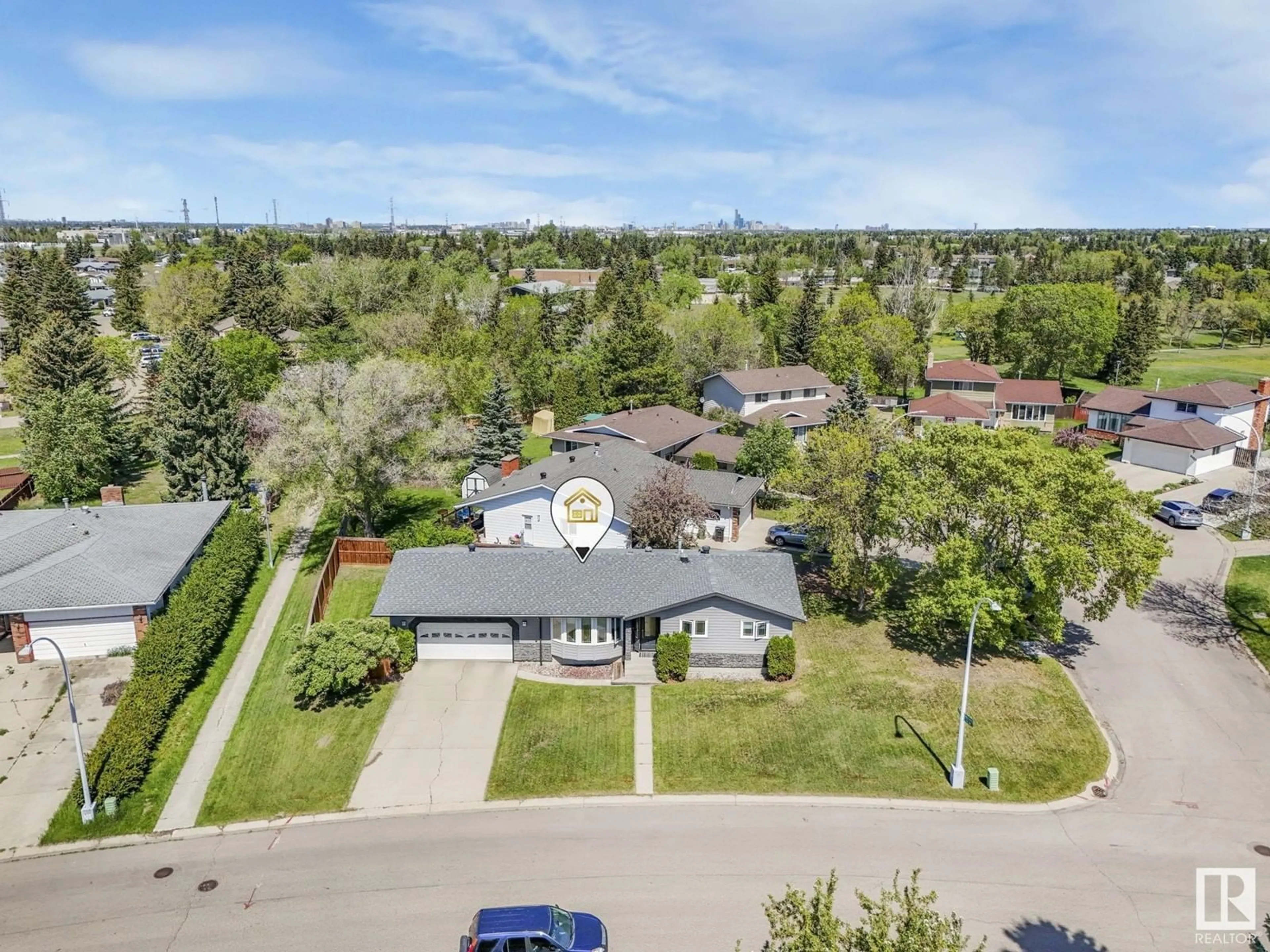 A pic from outside/outdoor area/front of a property/back of a property/a pic from drone, street for 8450 14 AV, Edmonton Alberta T6K1X4
