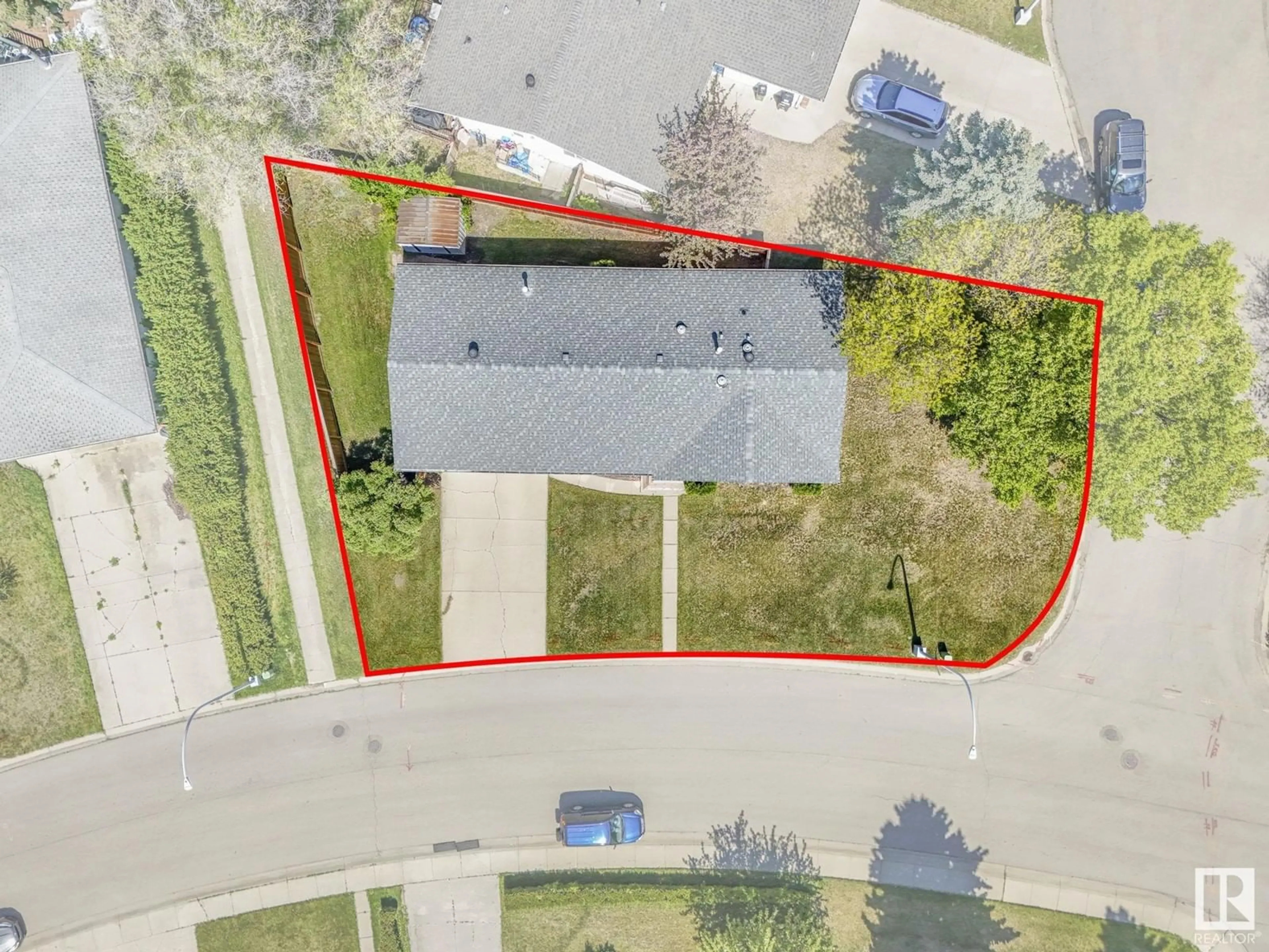 A pic from outside/outdoor area/front of a property/back of a property/a pic from drone, street for 8450 14 AV, Edmonton Alberta T6K1X4