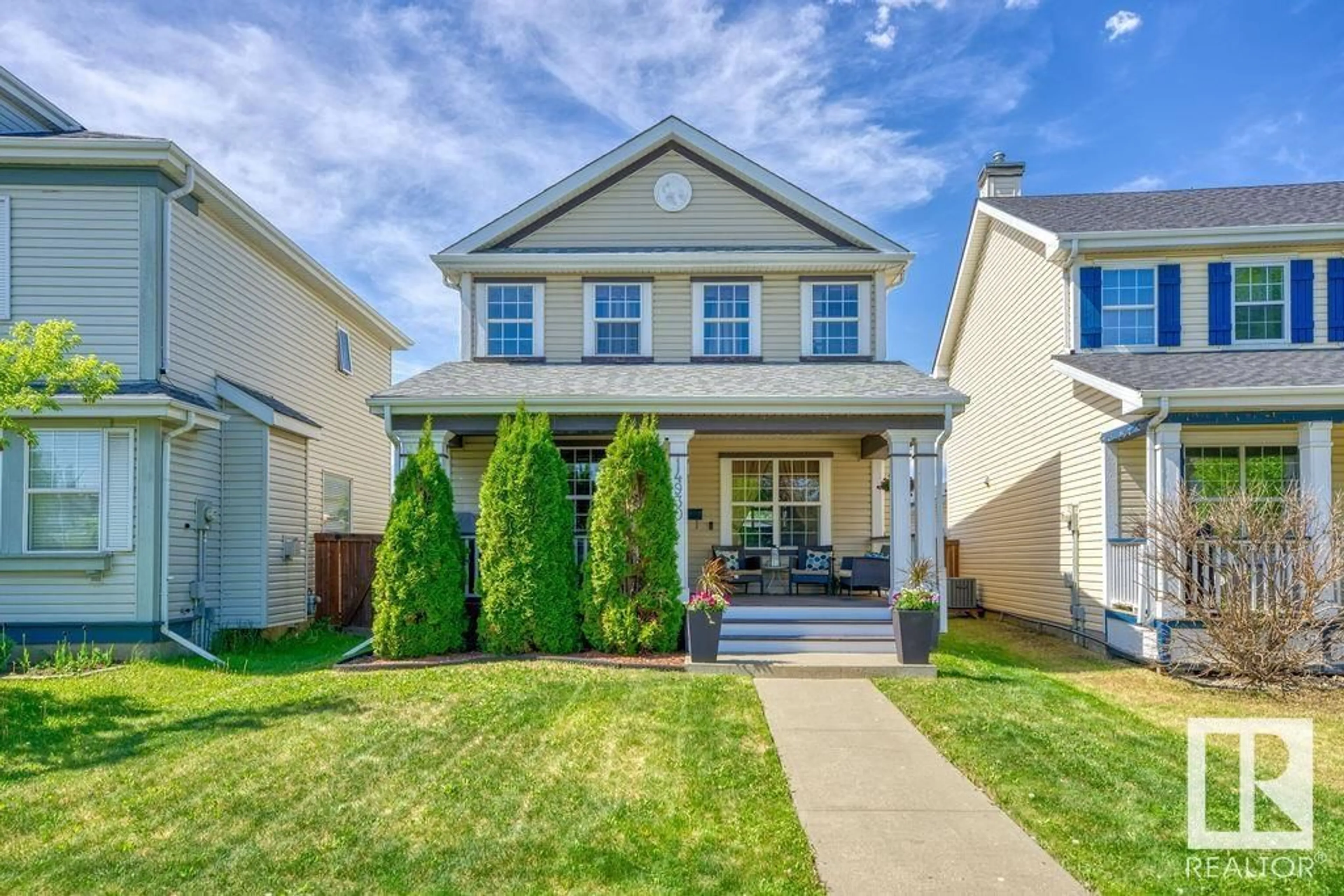 Home with vinyl exterior material, street for 14930 139 ST, Edmonton Alberta T6V1T7