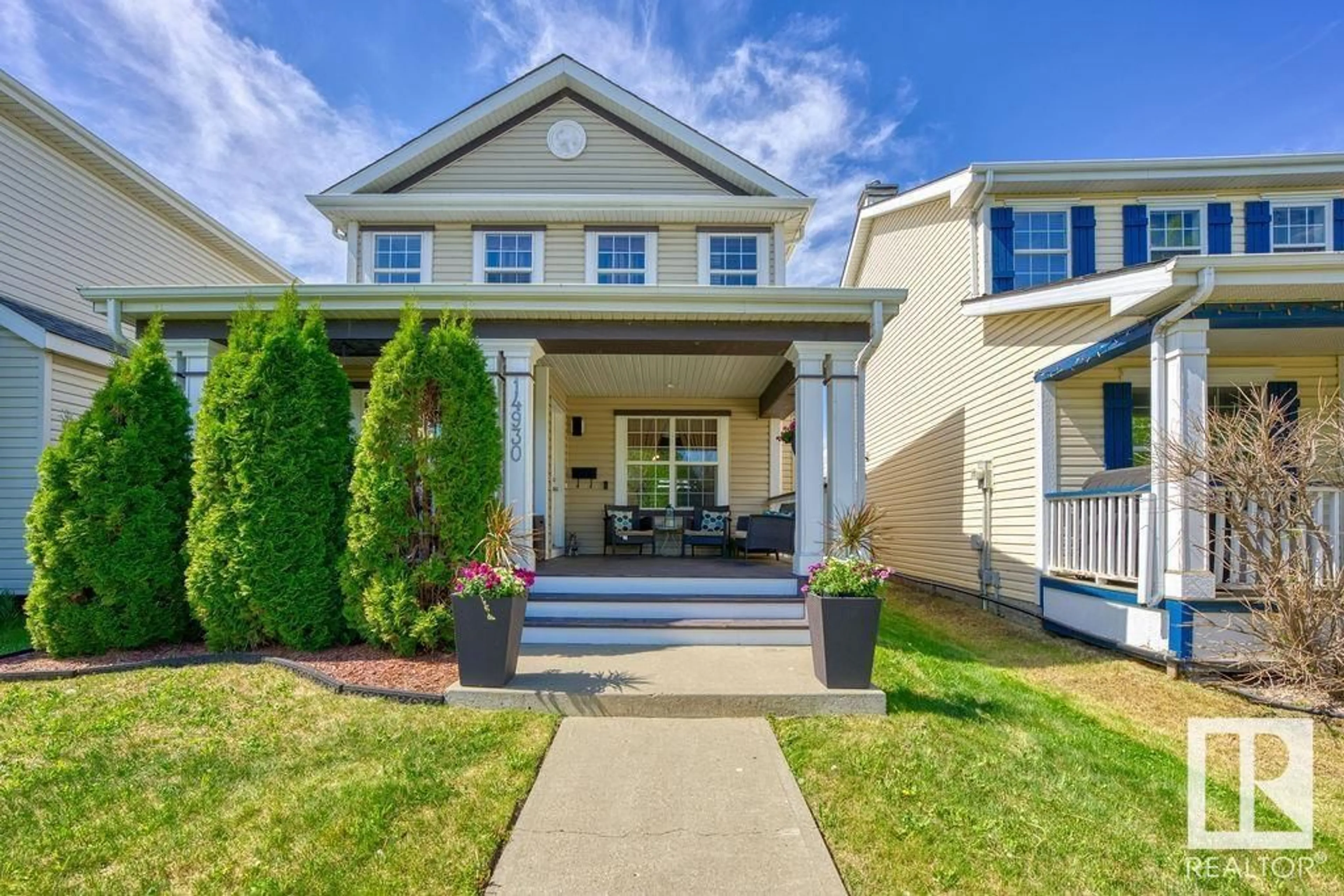 Home with vinyl exterior material, street for 14930 139 ST, Edmonton Alberta T6V1T7