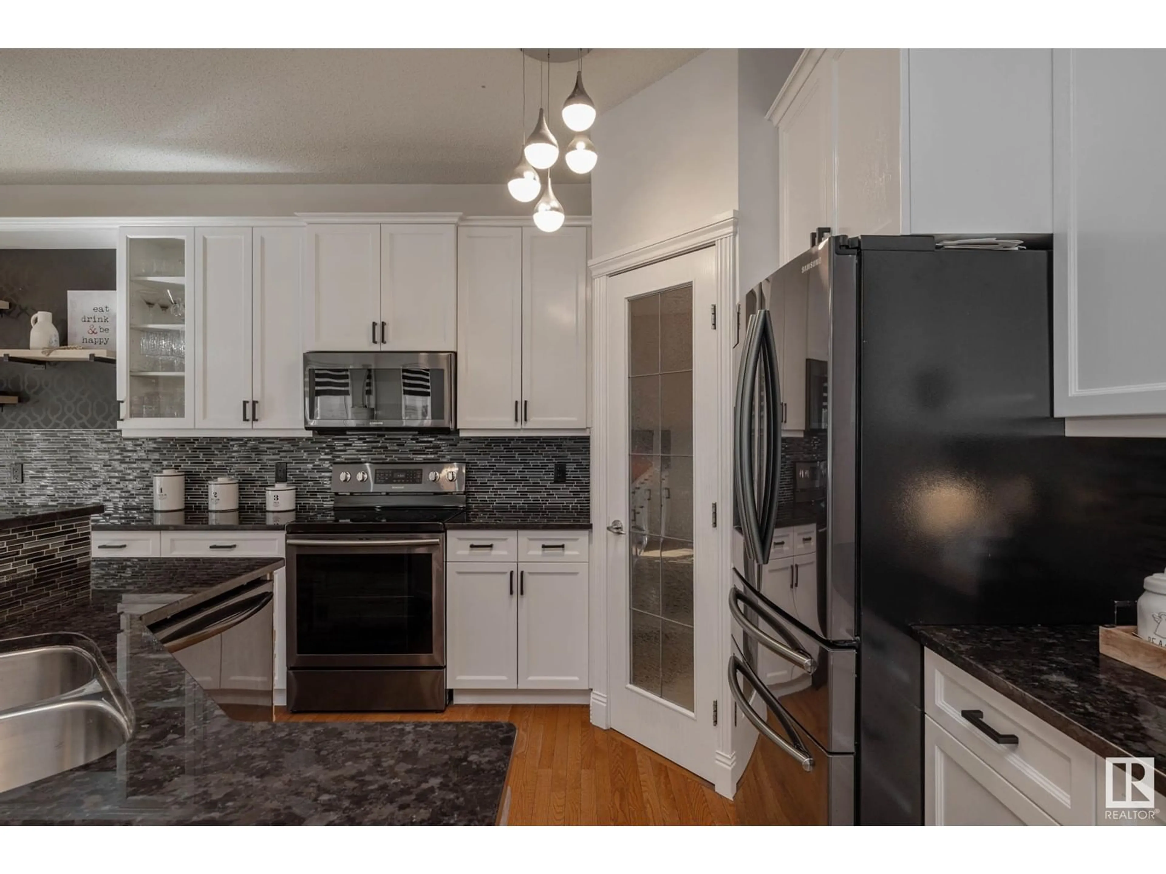 Open concept kitchen, unknown for 17828 109 ST, Edmonton Alberta T5X6K5
